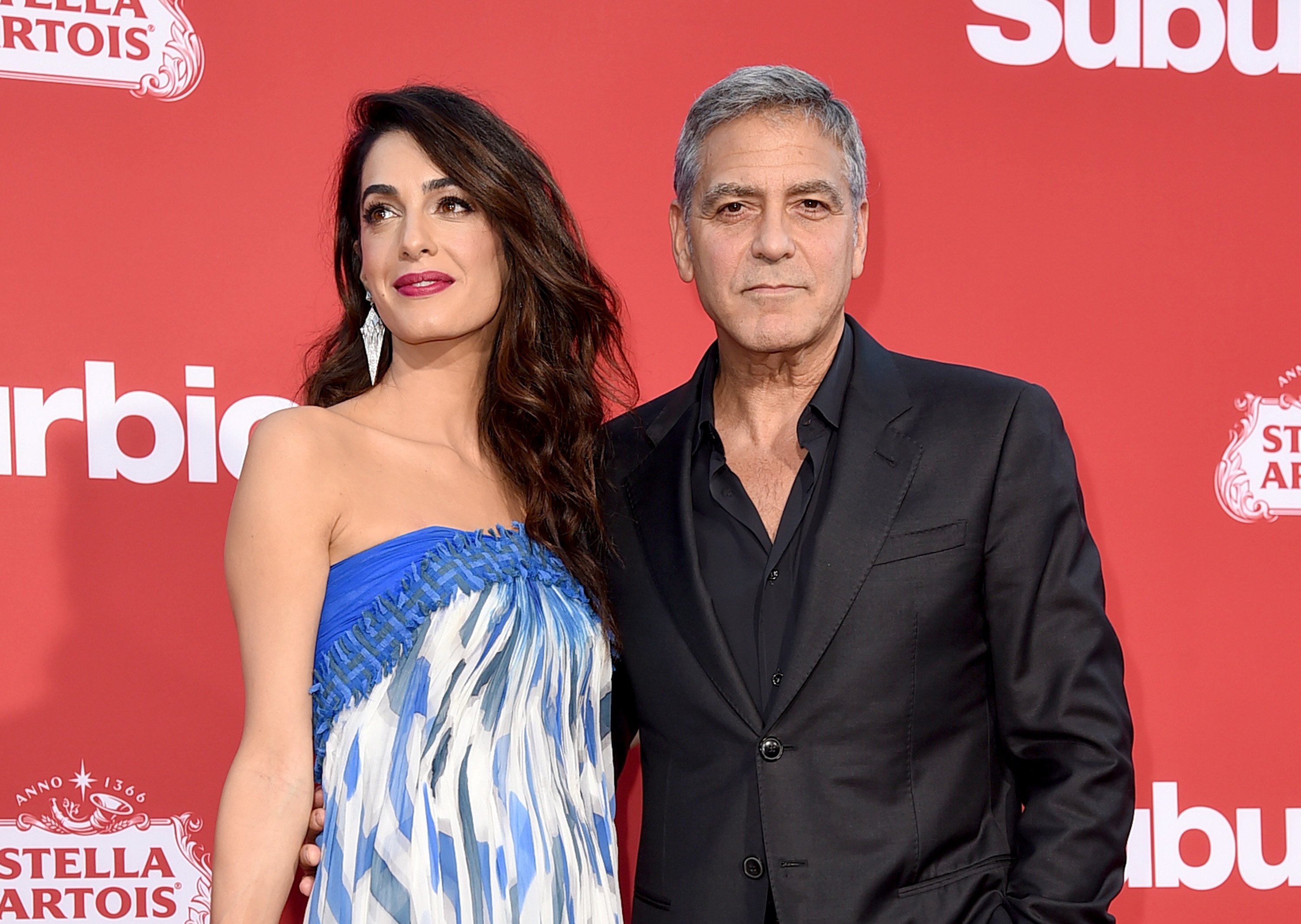 George Clooney y su esposa Amal Clooney en el cine de Village Theatre, el 22 de octubre de 2017 en Los Ángeles, California. | Foto: Getty Images
