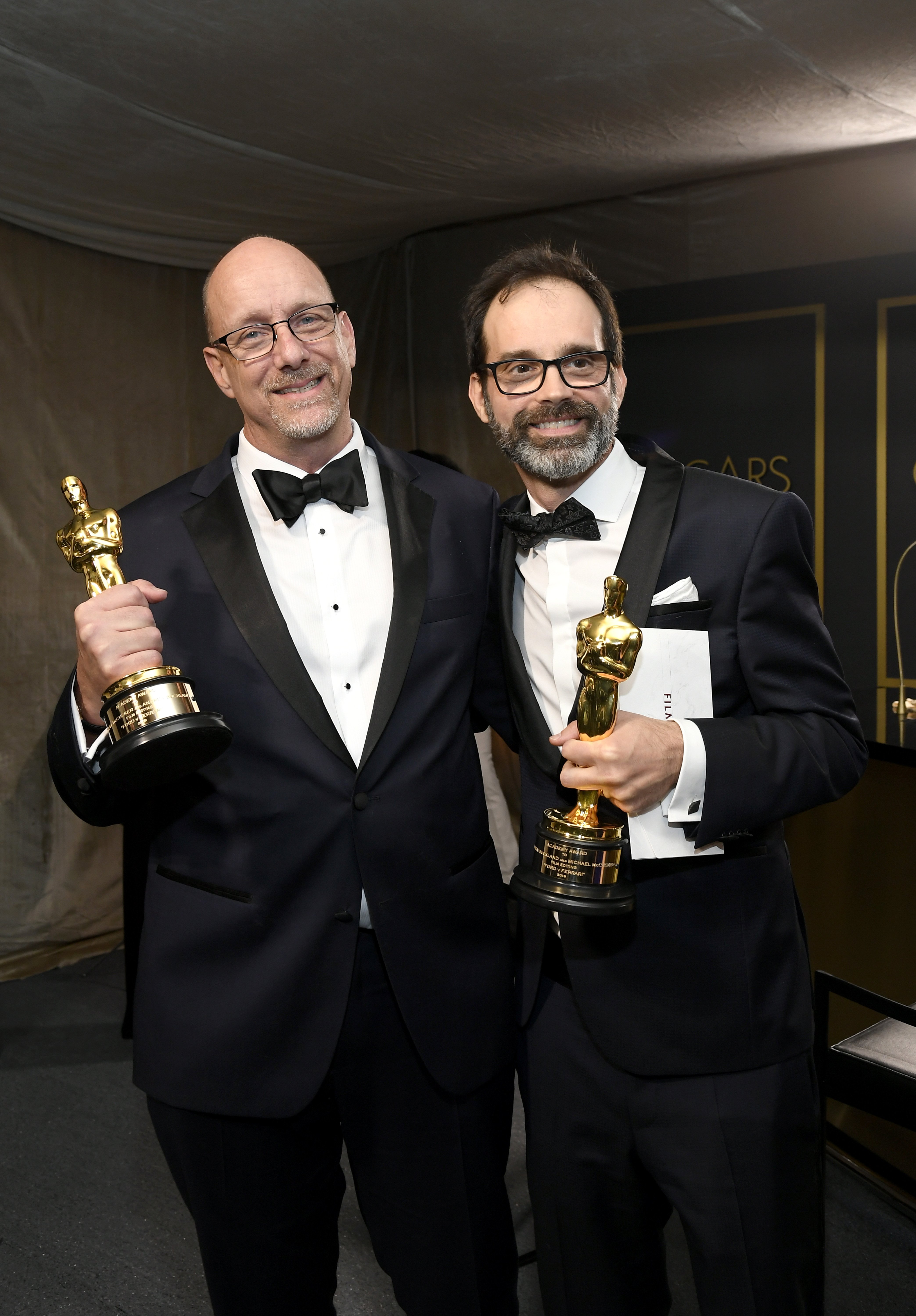 Los editores de cine Michael McCusker y Andrew Buckland, ganadores del premio Film Editing por "Ford v Ferrari", asisten a la 92a edición anual de los Premios de la Academia Governors Ball en Hollywood y Highland el 9 de febrero de 2020 en Hollywood, California. | Foto: Getty Images