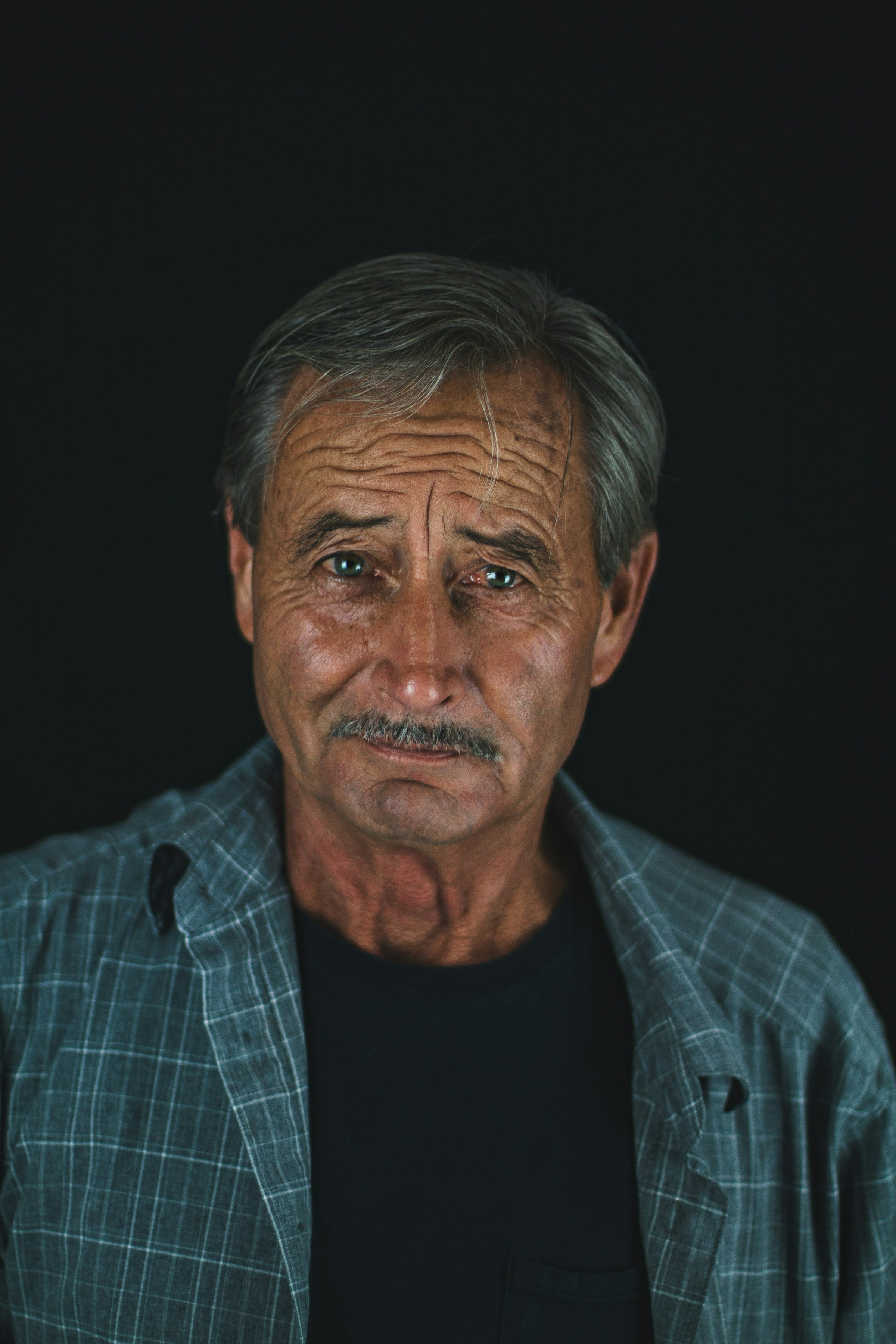 Un anciano sonriente | Foto: Unsplash