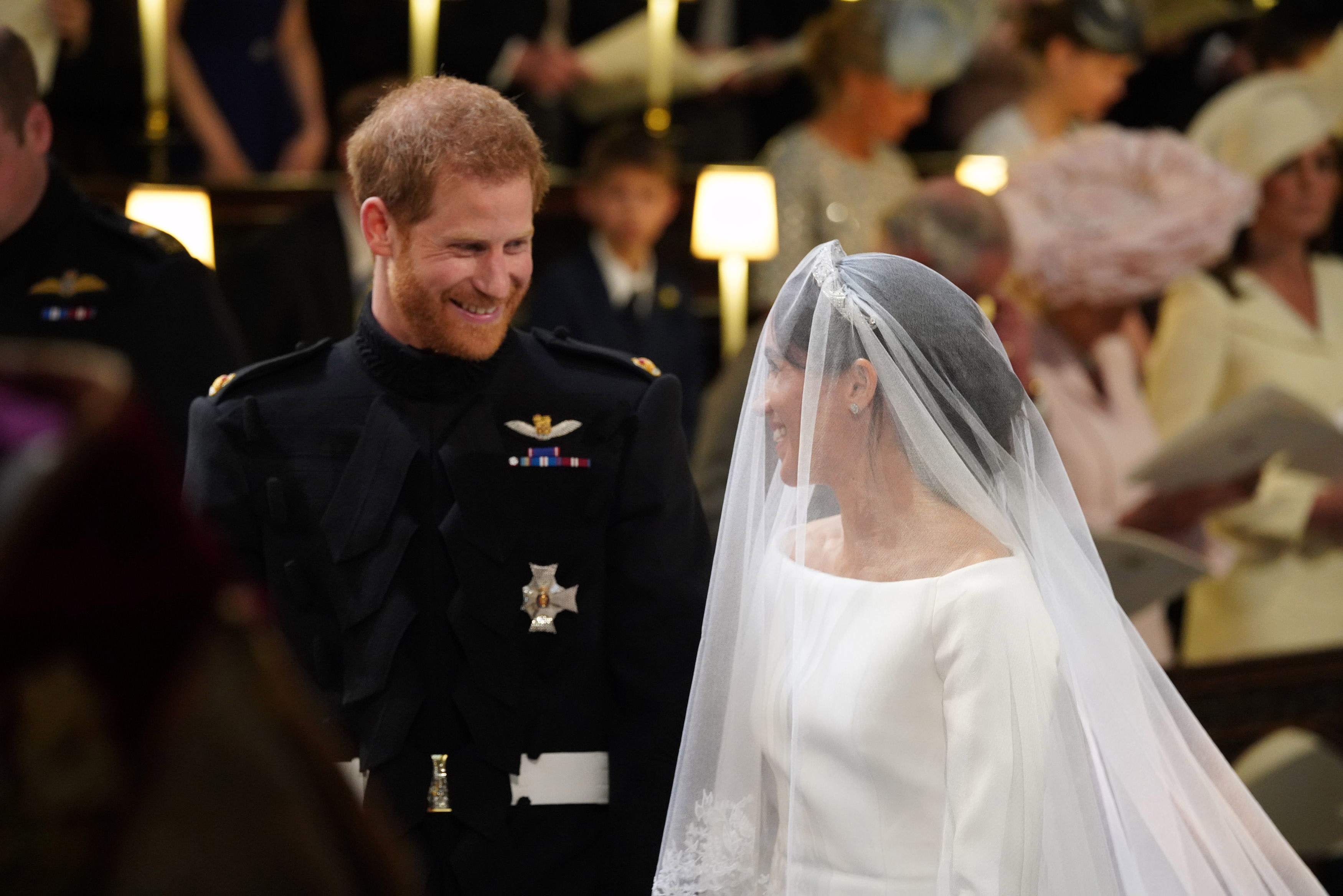 El príncipe Harry con su novia Meghan Markle durante su boda el 19 de mayo de 2018 en Windsor, Inglaterra | Fuente: Getty Images