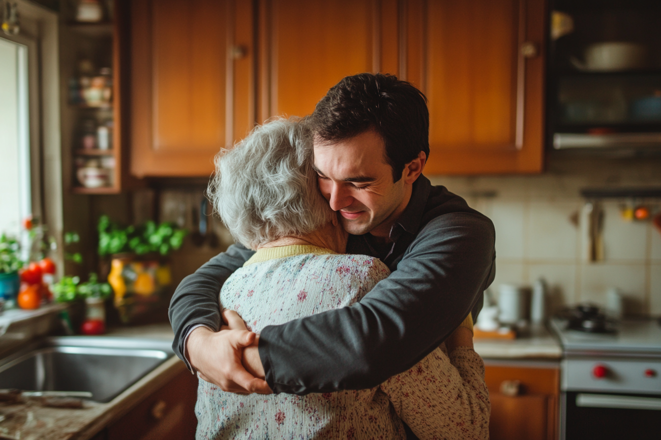 Un hombre abrazando a su madre | Fuente: Midjourney