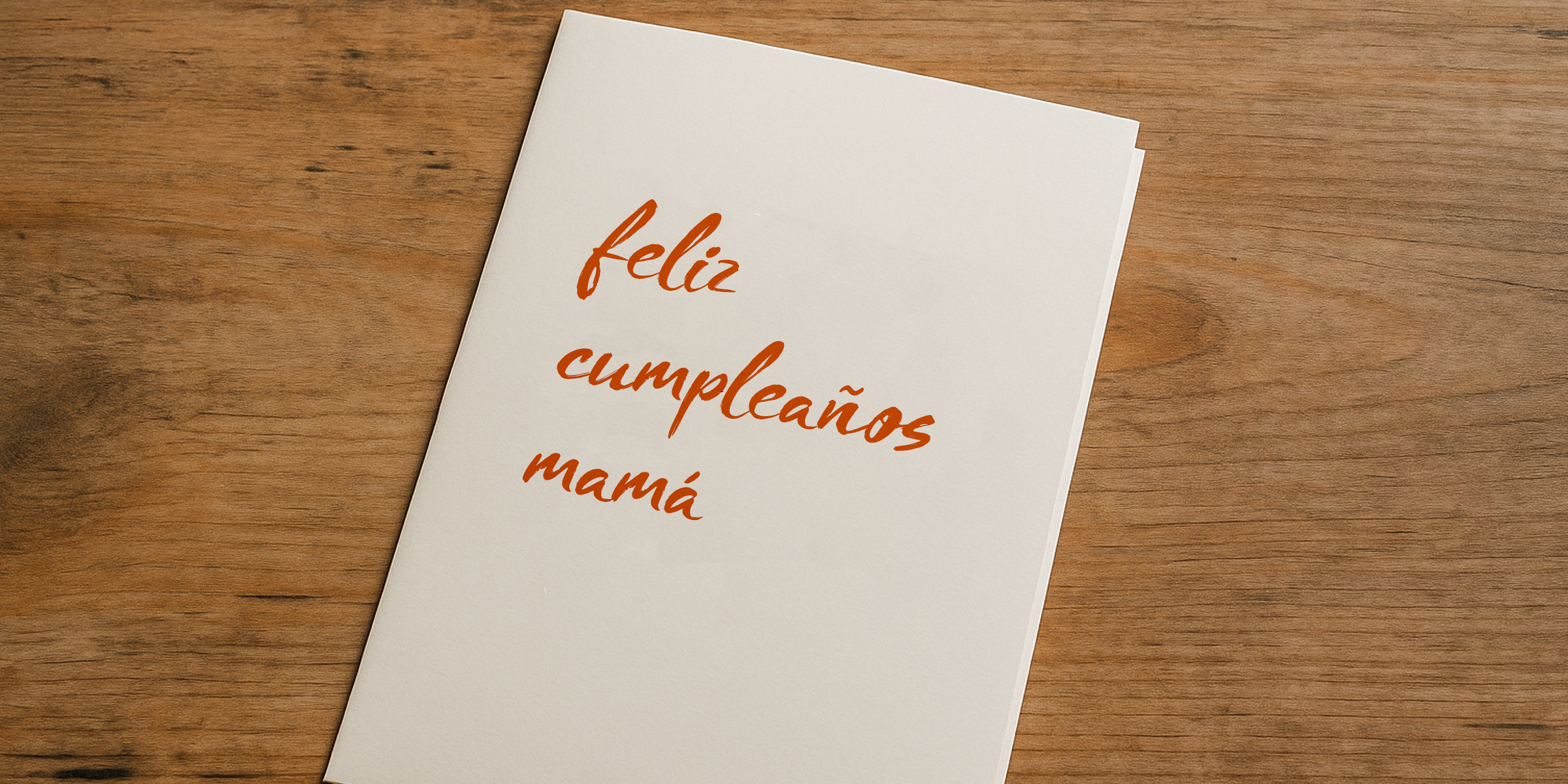 Una tarjeta de cumpleaños sobre una mesa | Fuente: Sora
