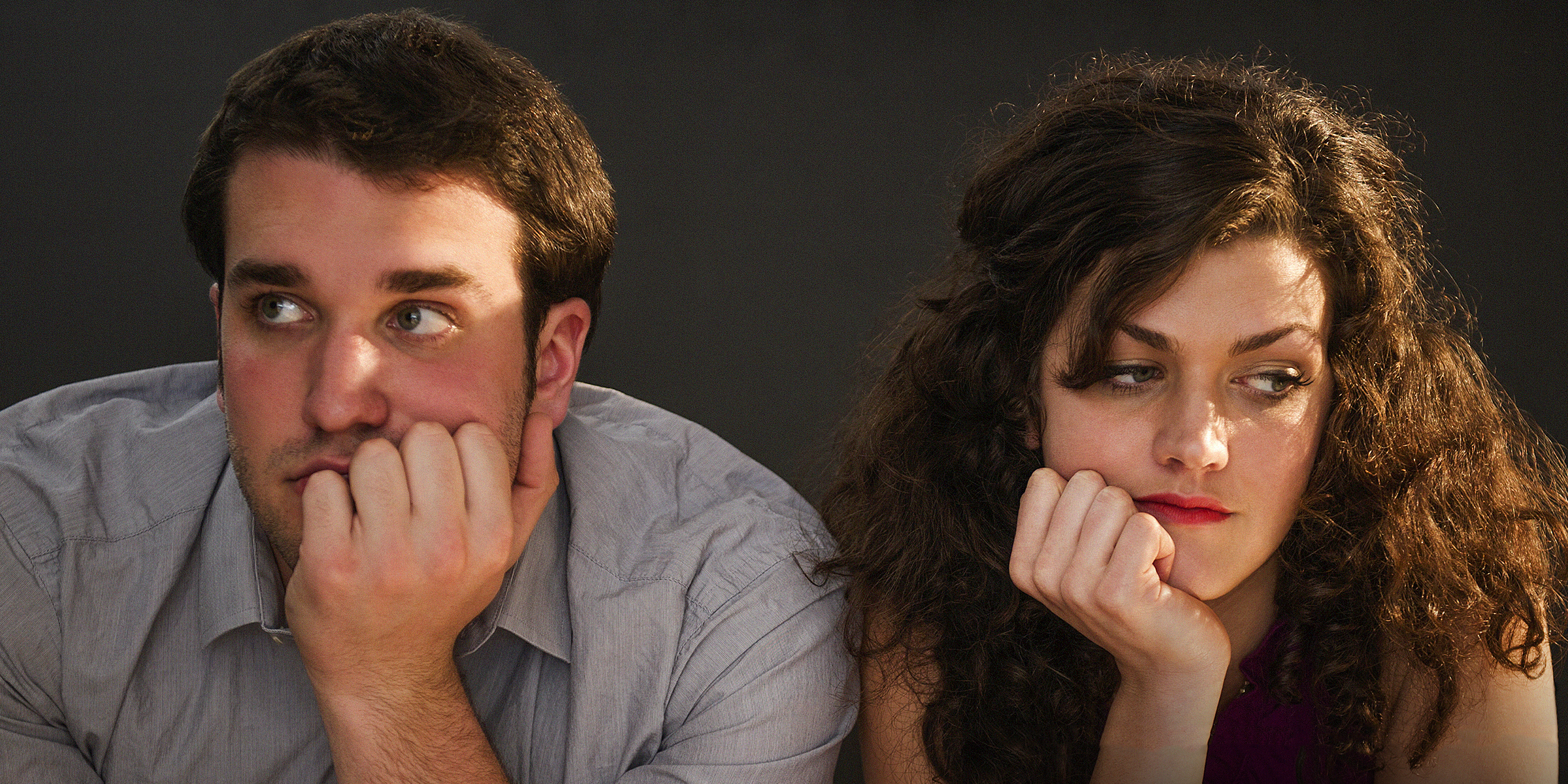 Pareja aburrida sentada en un bar | Fuente: Getty Images