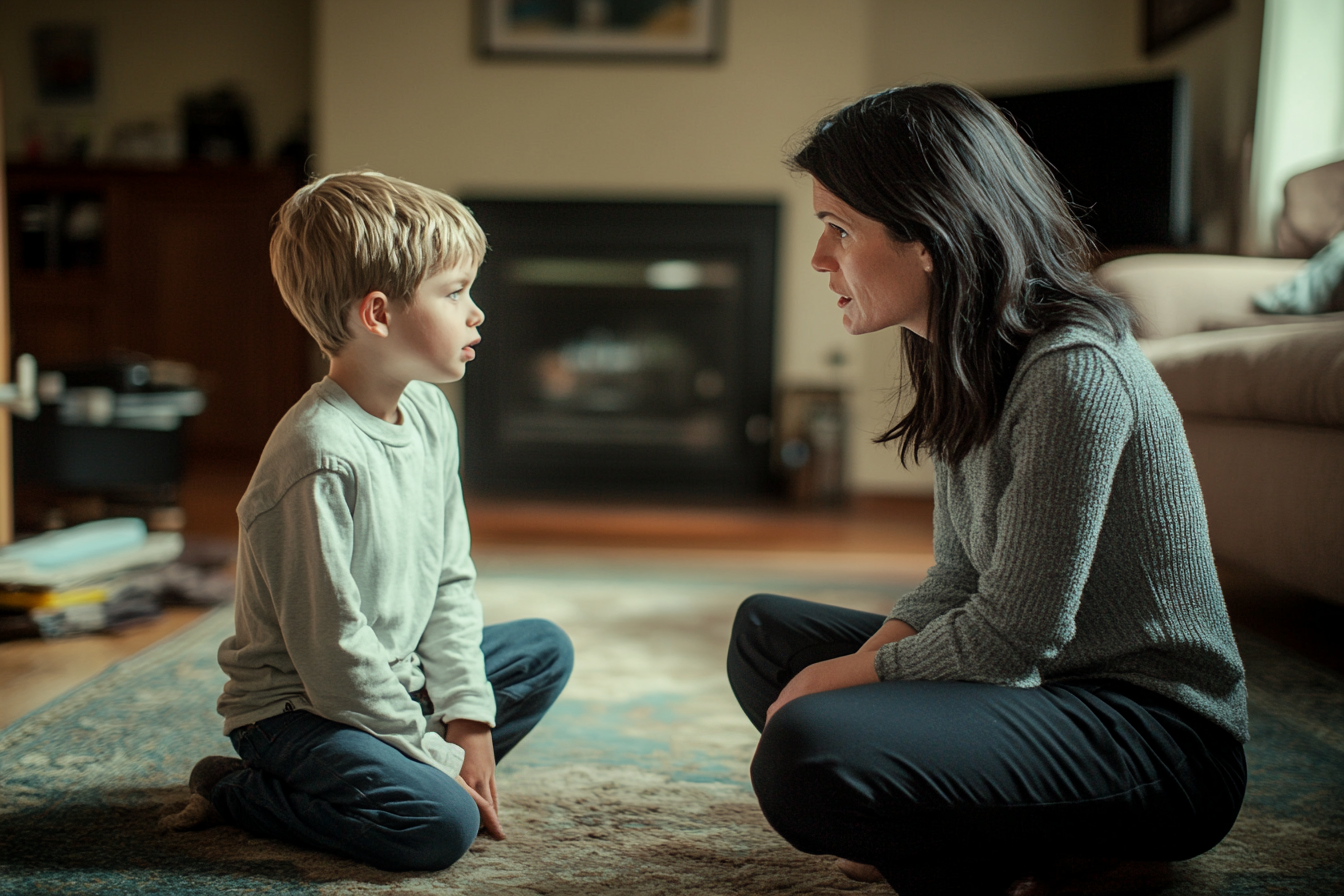 Una mujer hablando con un niño | Fuente: Midjourney