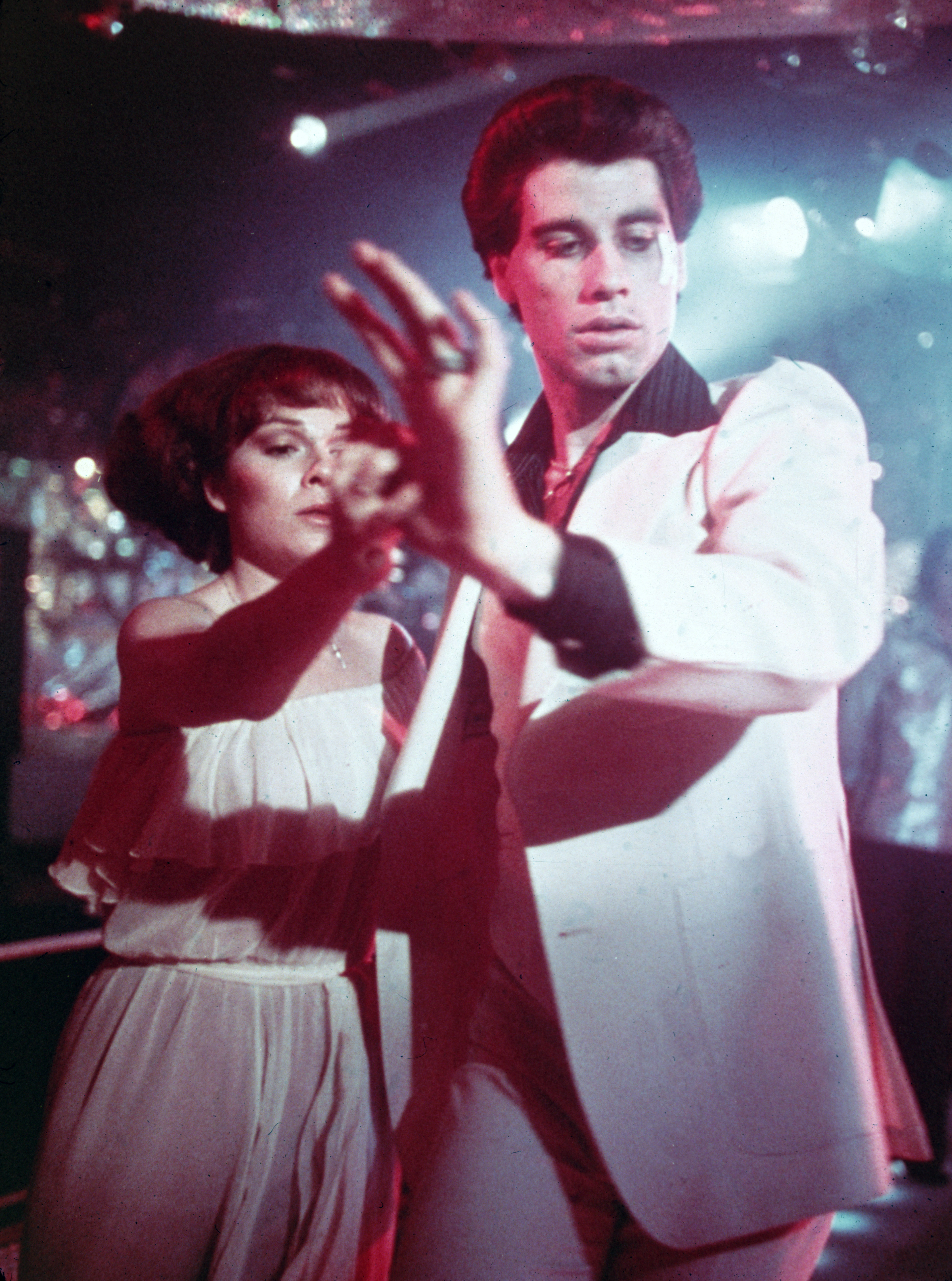 John Travolta y la actriz rodando "Saturday Night Fever" en 1977 | Fuente: Getty Images