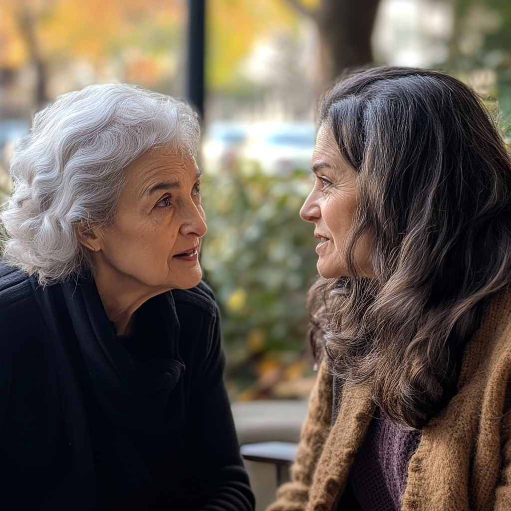 Mujeres manteniendo una conversación. | Fuente: Midjourney