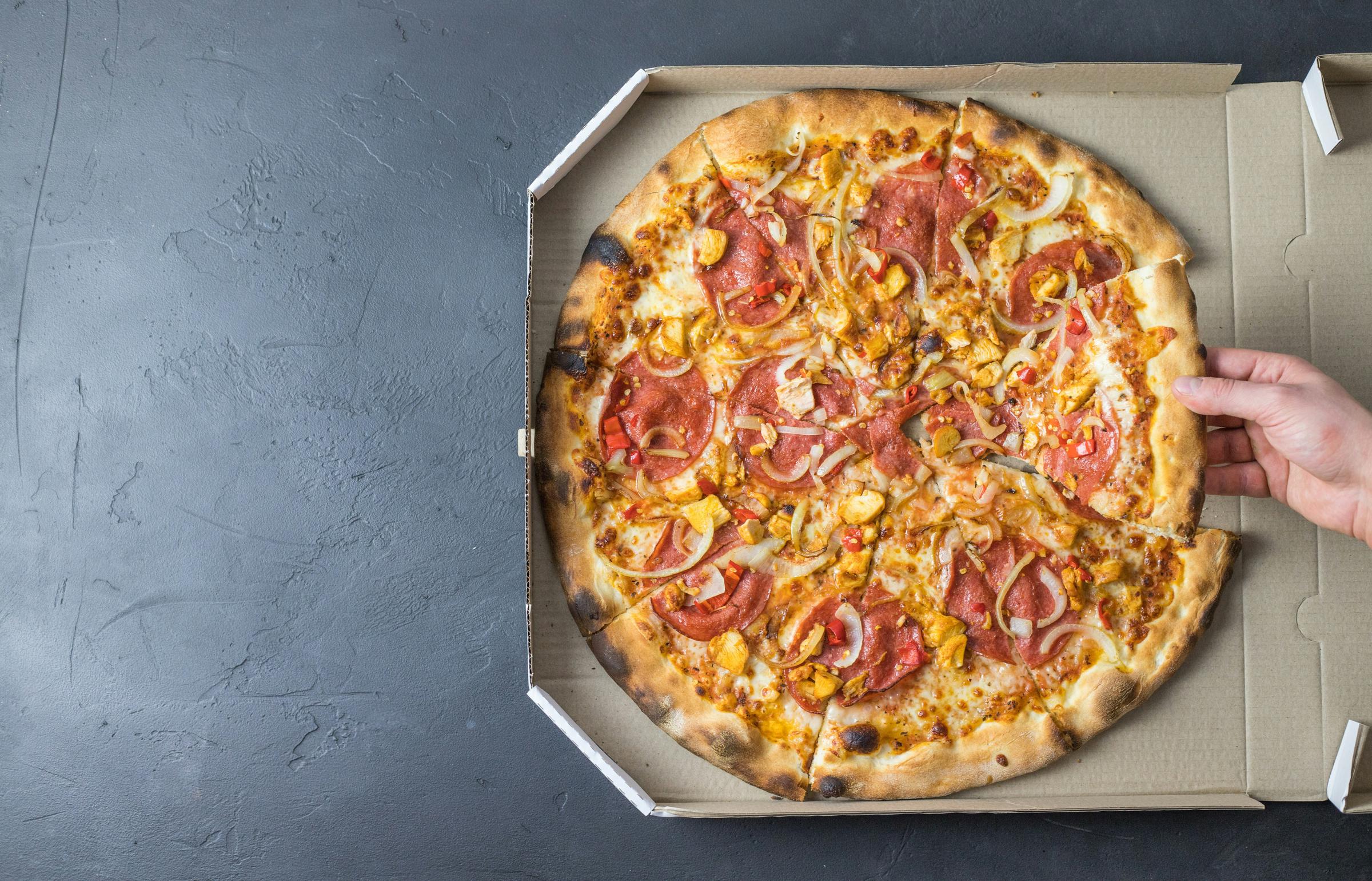 Una caja de pizza | Fuente: Unsplash