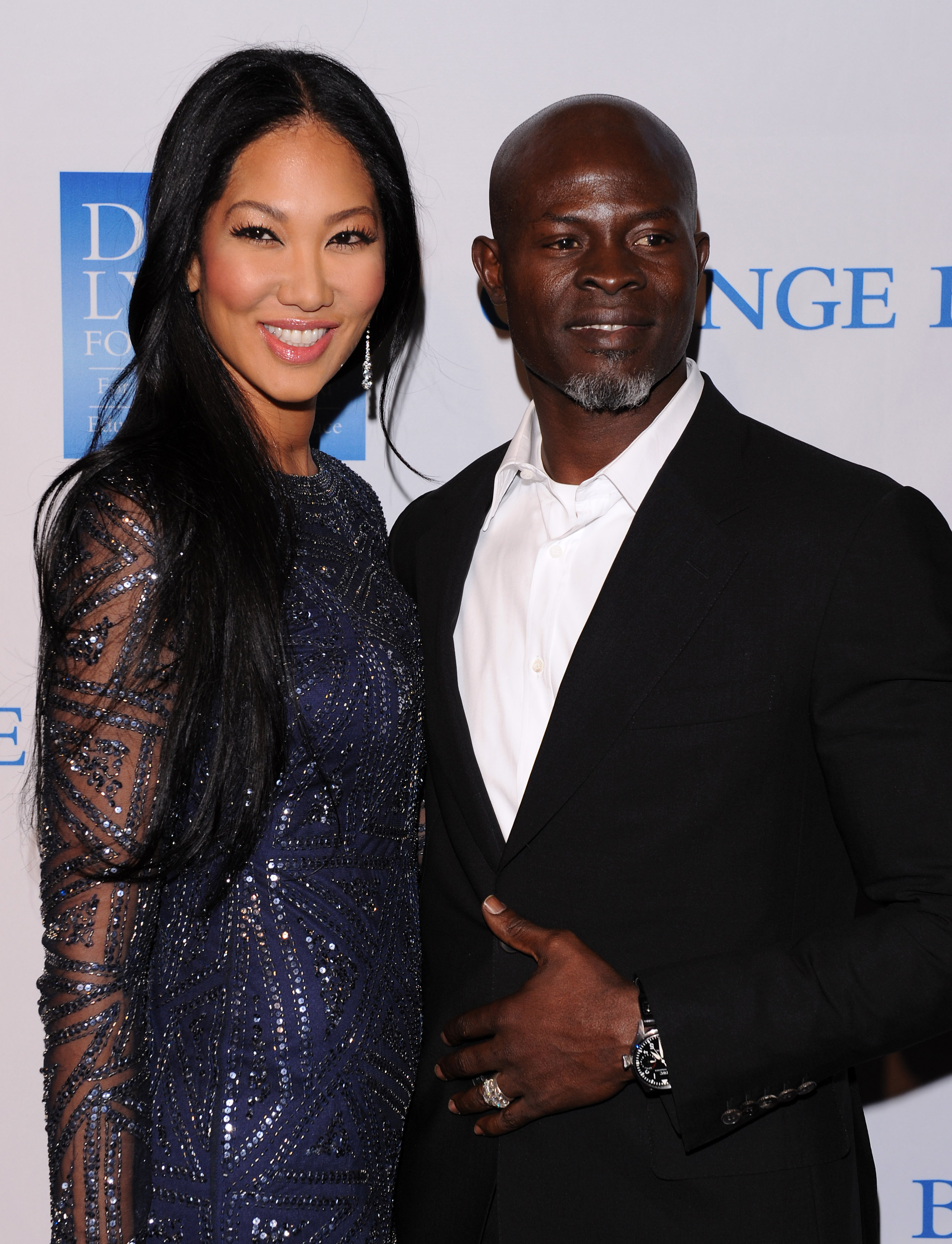 Kimora Lee Simmons y Djimon Hounso en la 3ª Celebración Benéfica Anual "Change Begins Within" el 3 de diciembre de 2011, en Los Ángeles, California | Fuente: Getty Images