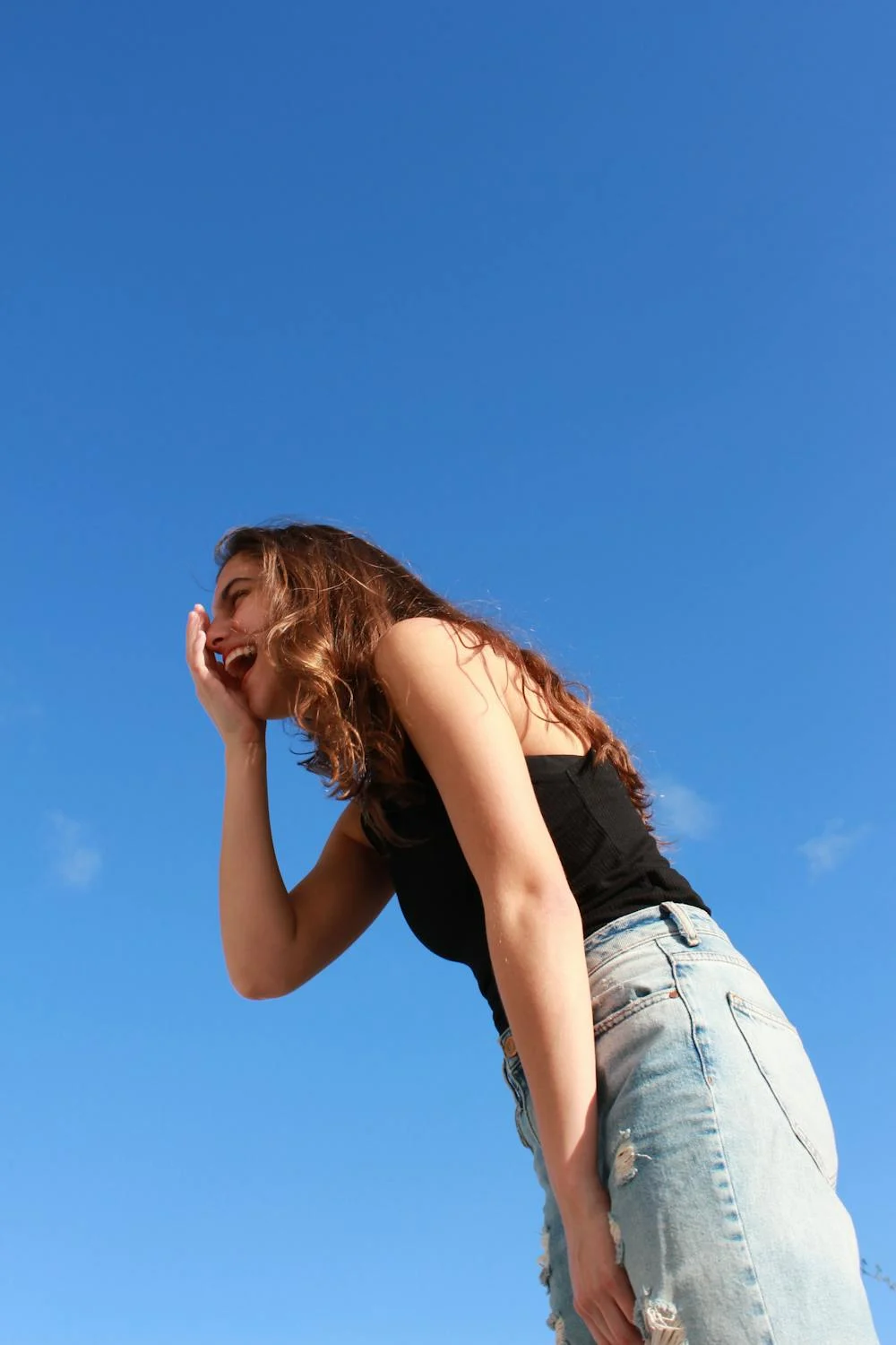 Una joven feliz | Fuente: Pexels