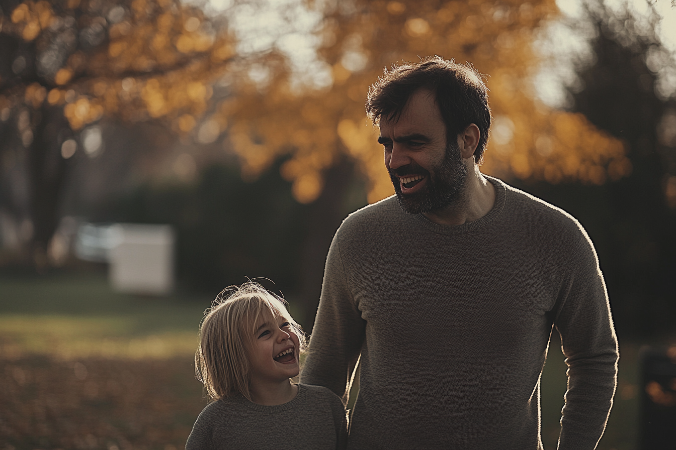 Un hombre y su hija en el parque | Fuente: Midjourney