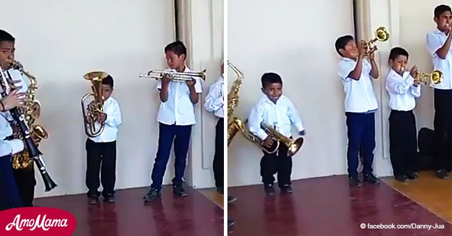 Niño mexicano enamora al público con su particular forma de tocar y bailar en una banda