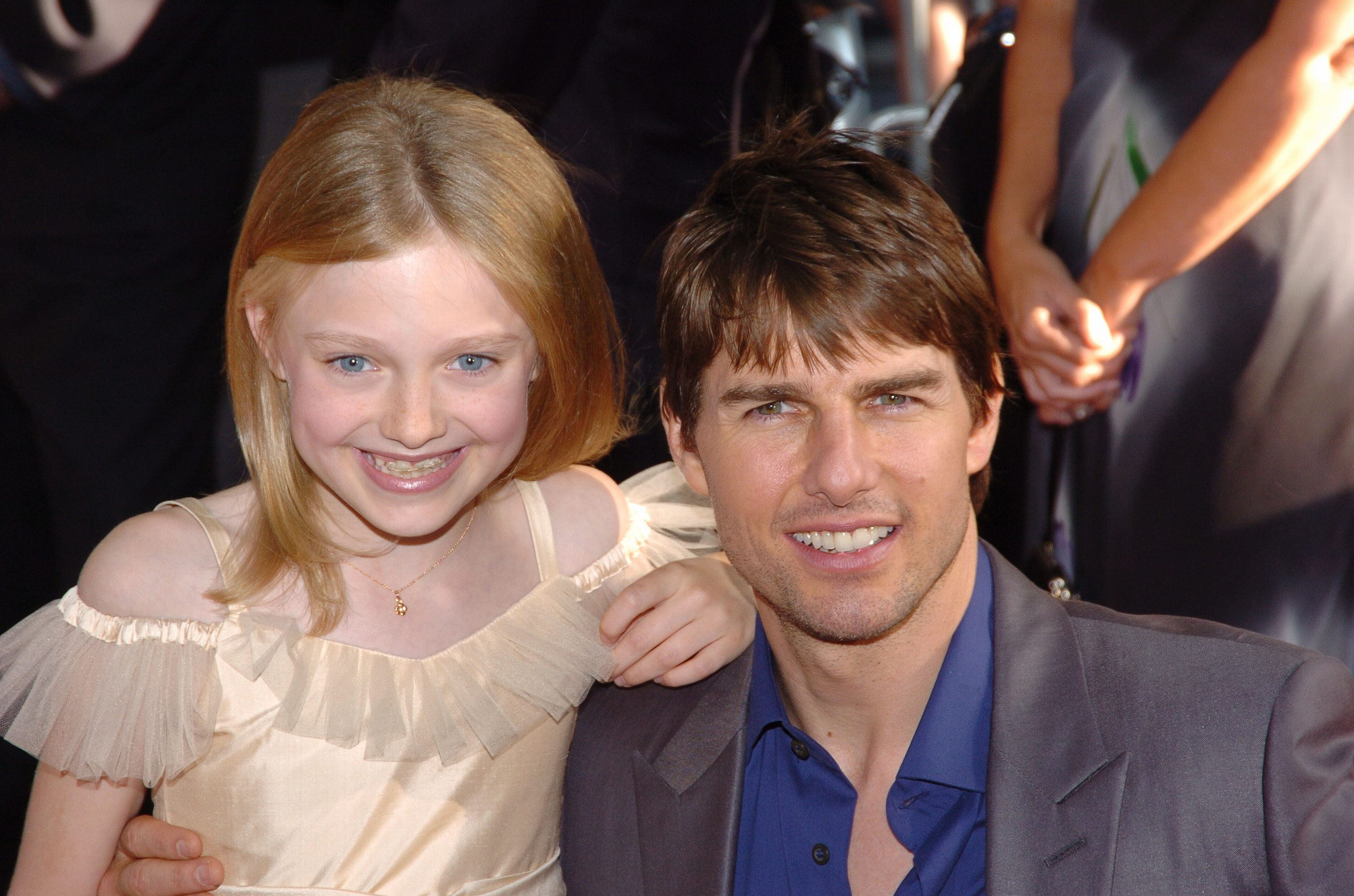 Tom Cruise y Dakota Fanning asisten al estreno de "War of the Worlds" el 23 de junio de 2005 en Nueva York | Foto: Getty Images
