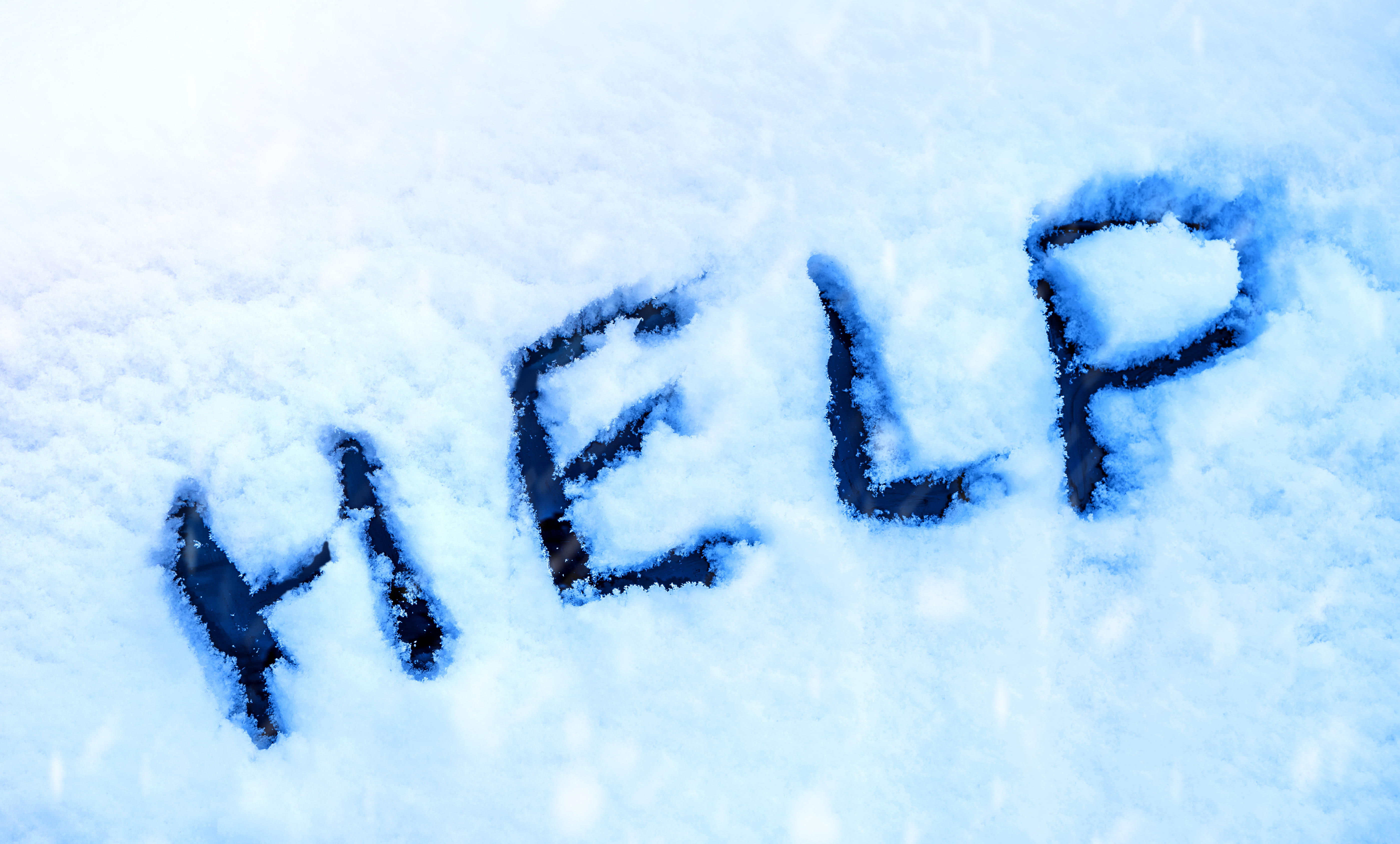 Word Help, escrito sobre una nieve. | Fuente: Shutterstock