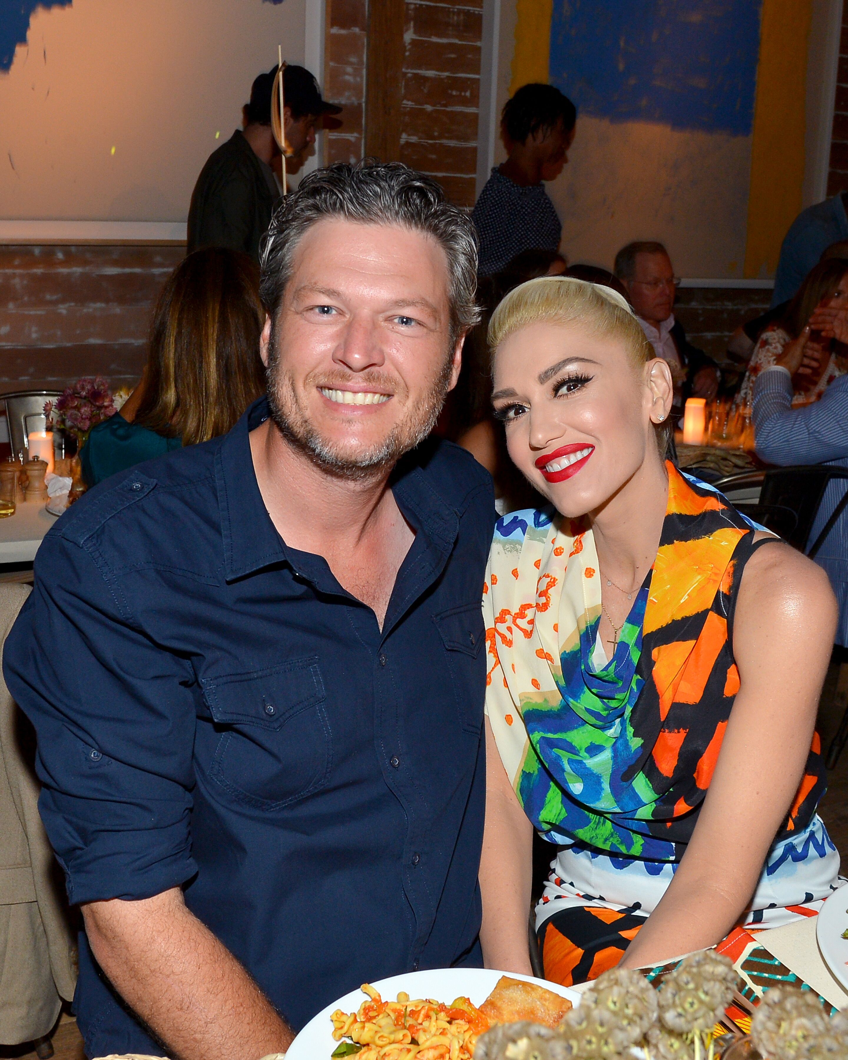 Blake Shelton y Gwen Stefani en la fiesta Apollo en los Hamptons el 20 de agosto de 2016, en East Hampton, Nueva York | Foto: Getty Images