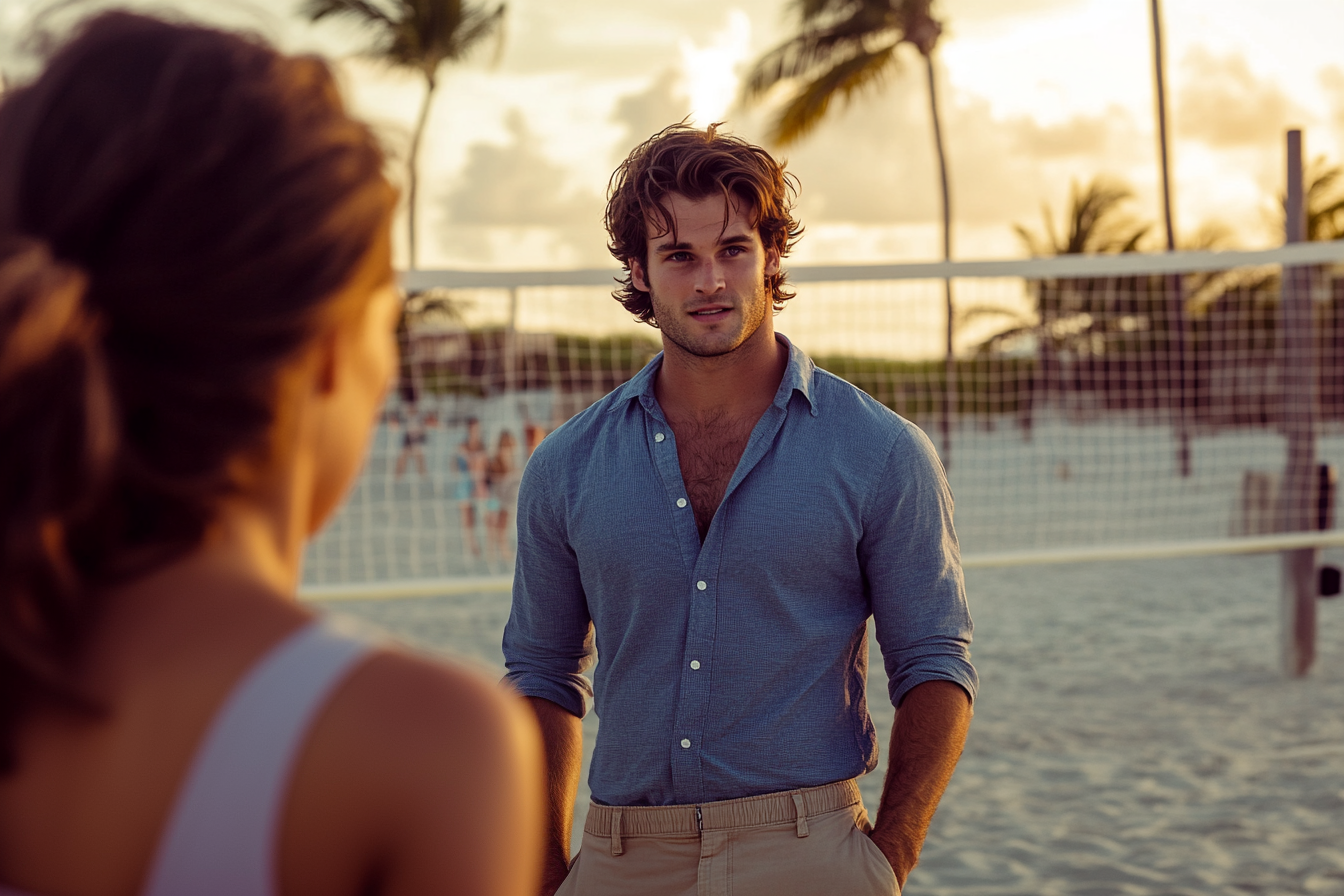 Hombre de unos 30 años hablando con una mujer cerca de una pista de voleibol en una playa de arena | Fuente: Midjourney