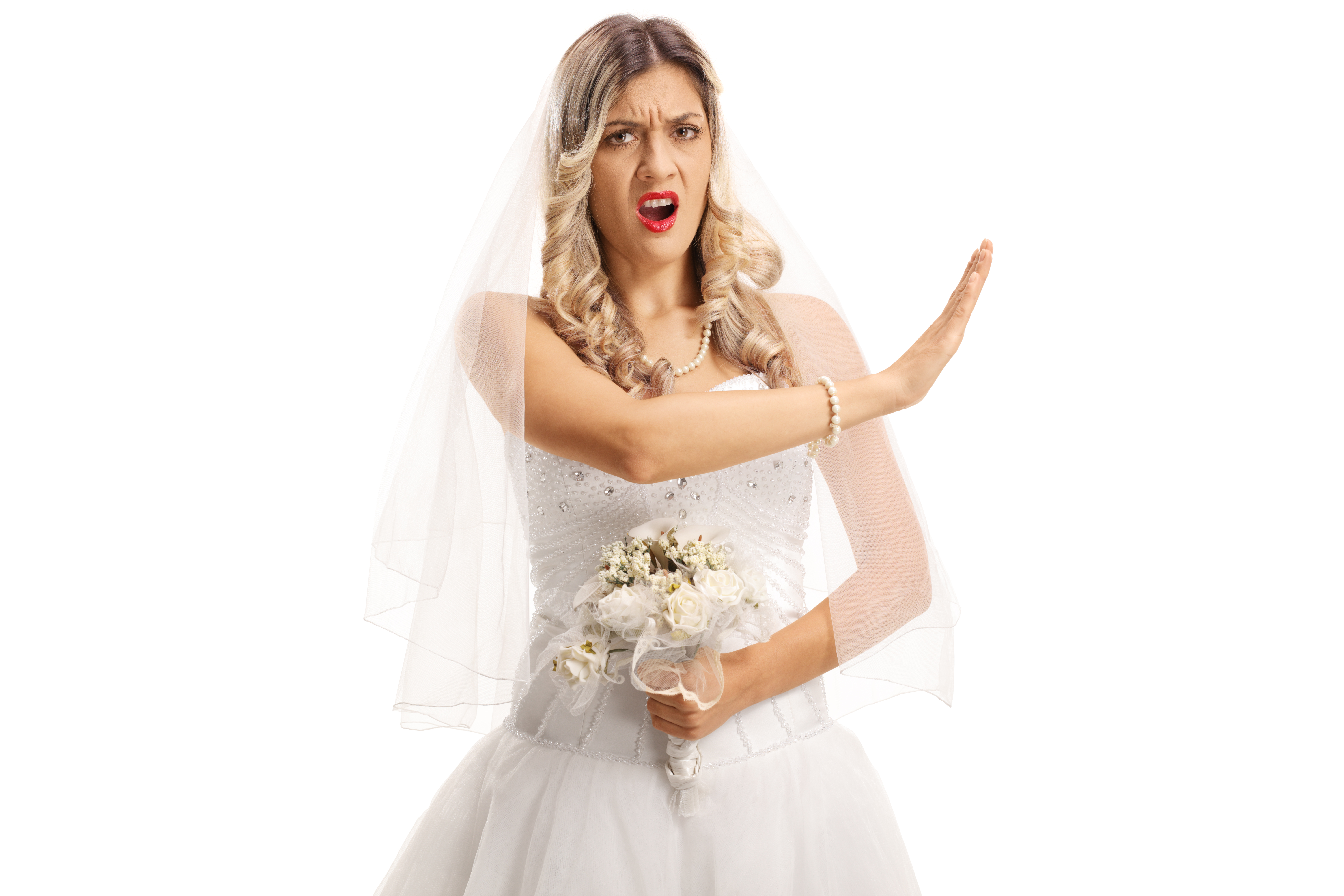 Una novia enfadada enseñando a alguien a parar | Fuente: Shutterstock