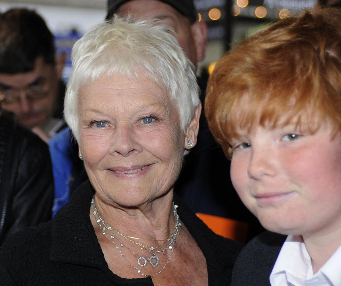 Judi Dench y Sam Williams en la noche de prensa de "Betty Blue Eyes" en Londres, el 13 de abril de 2011 | Fuente: Getty Images