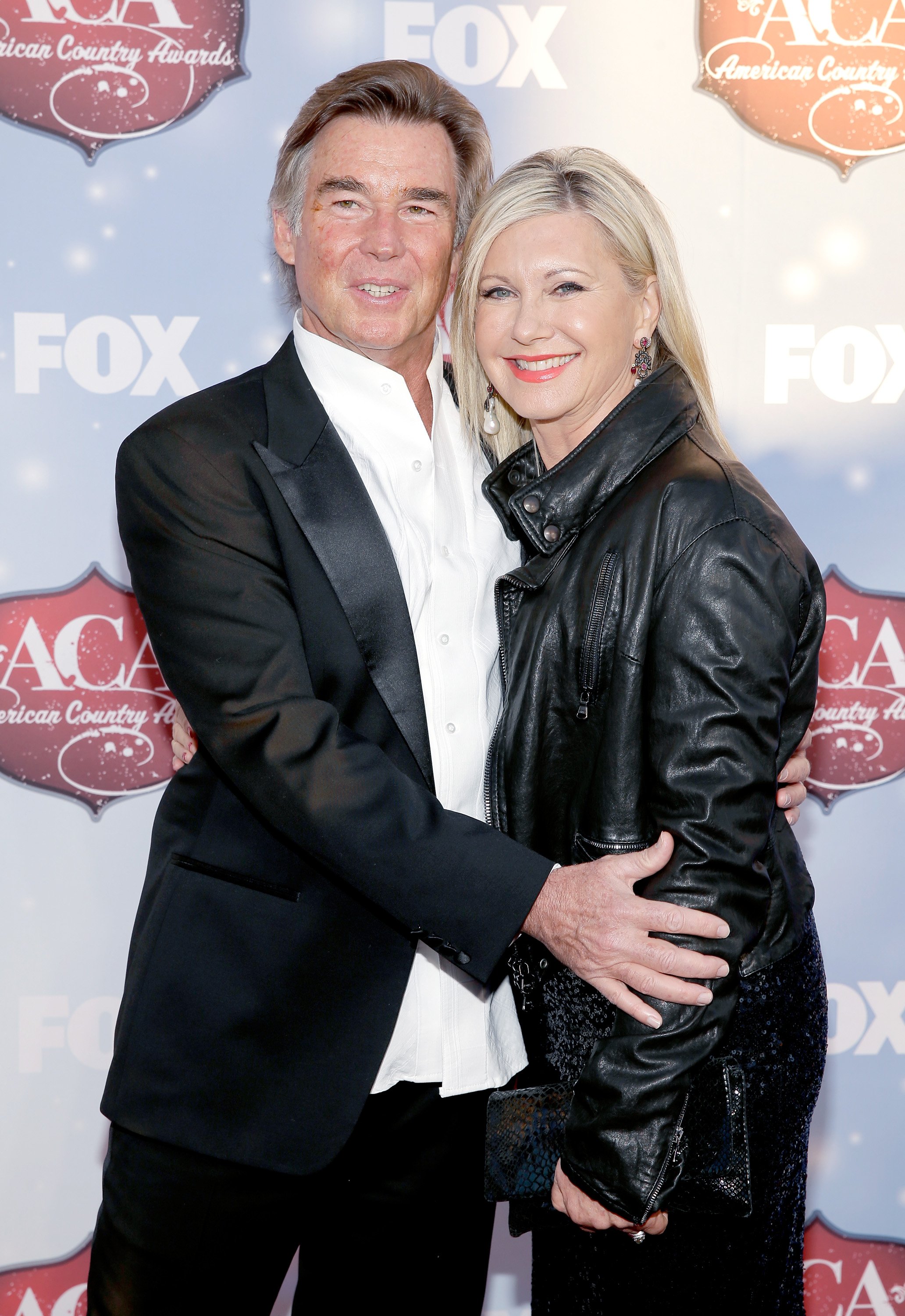 Olivia Newton-John con su esposo John Easterling en Los Ángeles, en 2013. | Foto: Getty Images