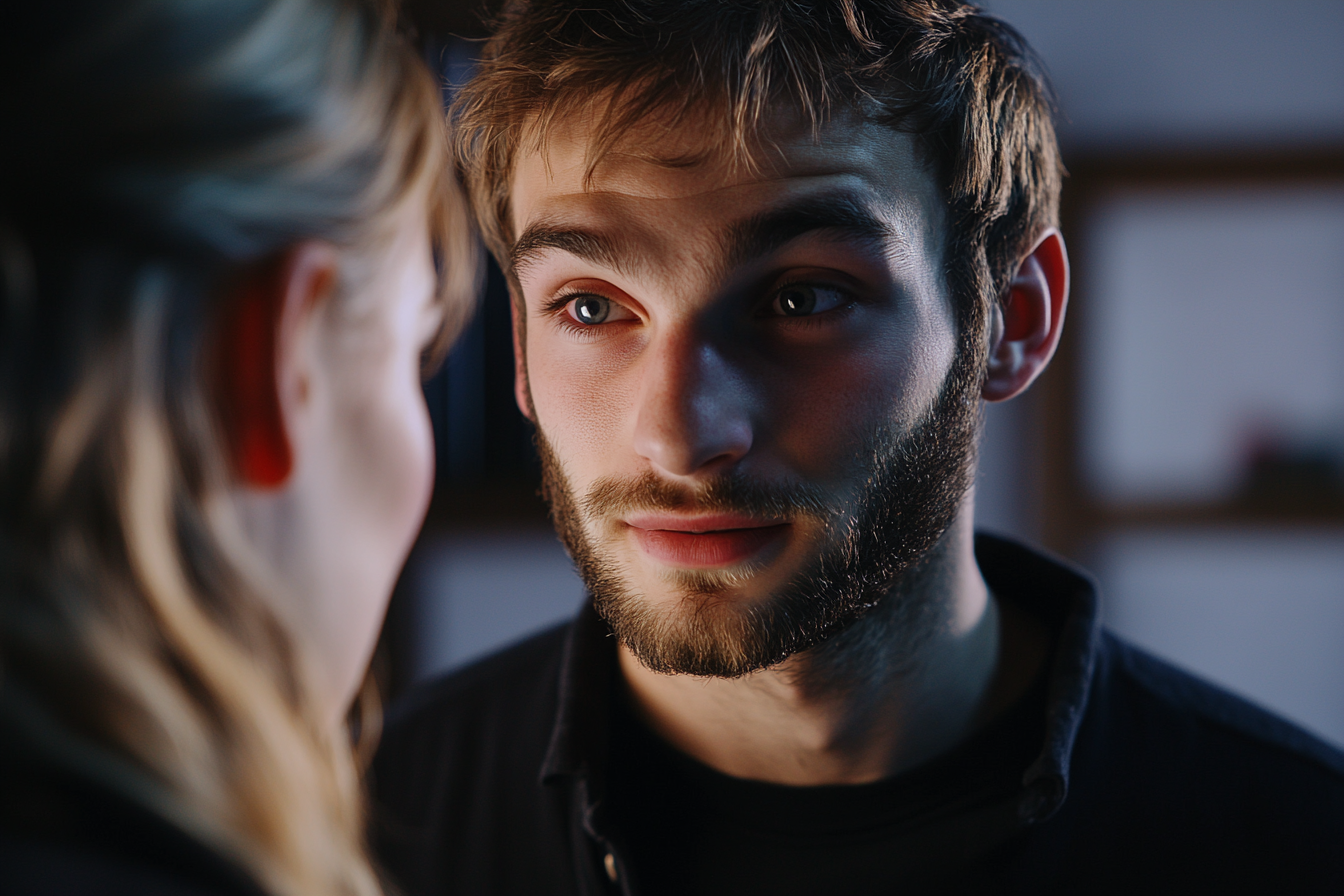 Un hombre mira fijamente a una mujer | Fuente: Midjourney