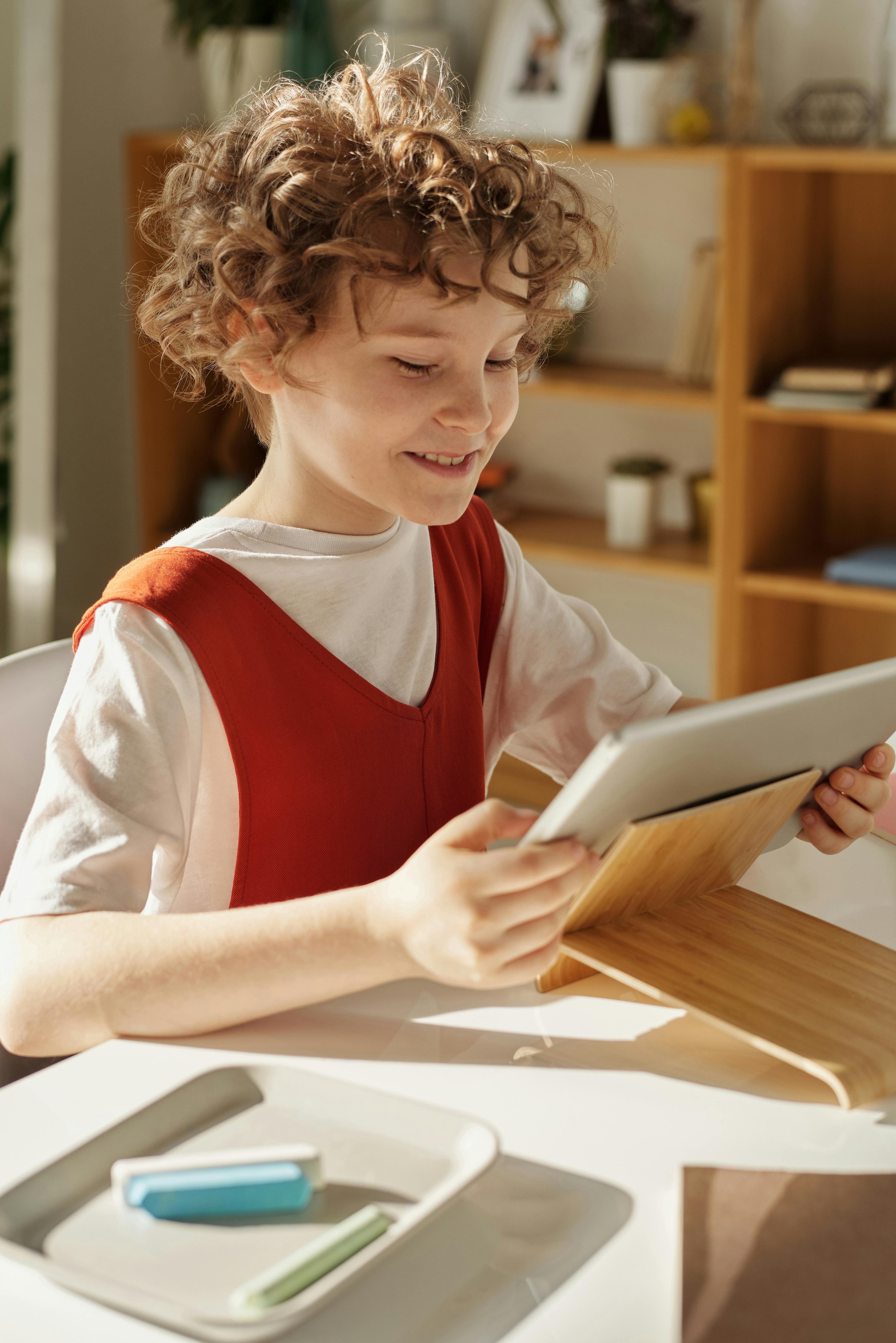 Un niño sonriente | Fuente: Pexels