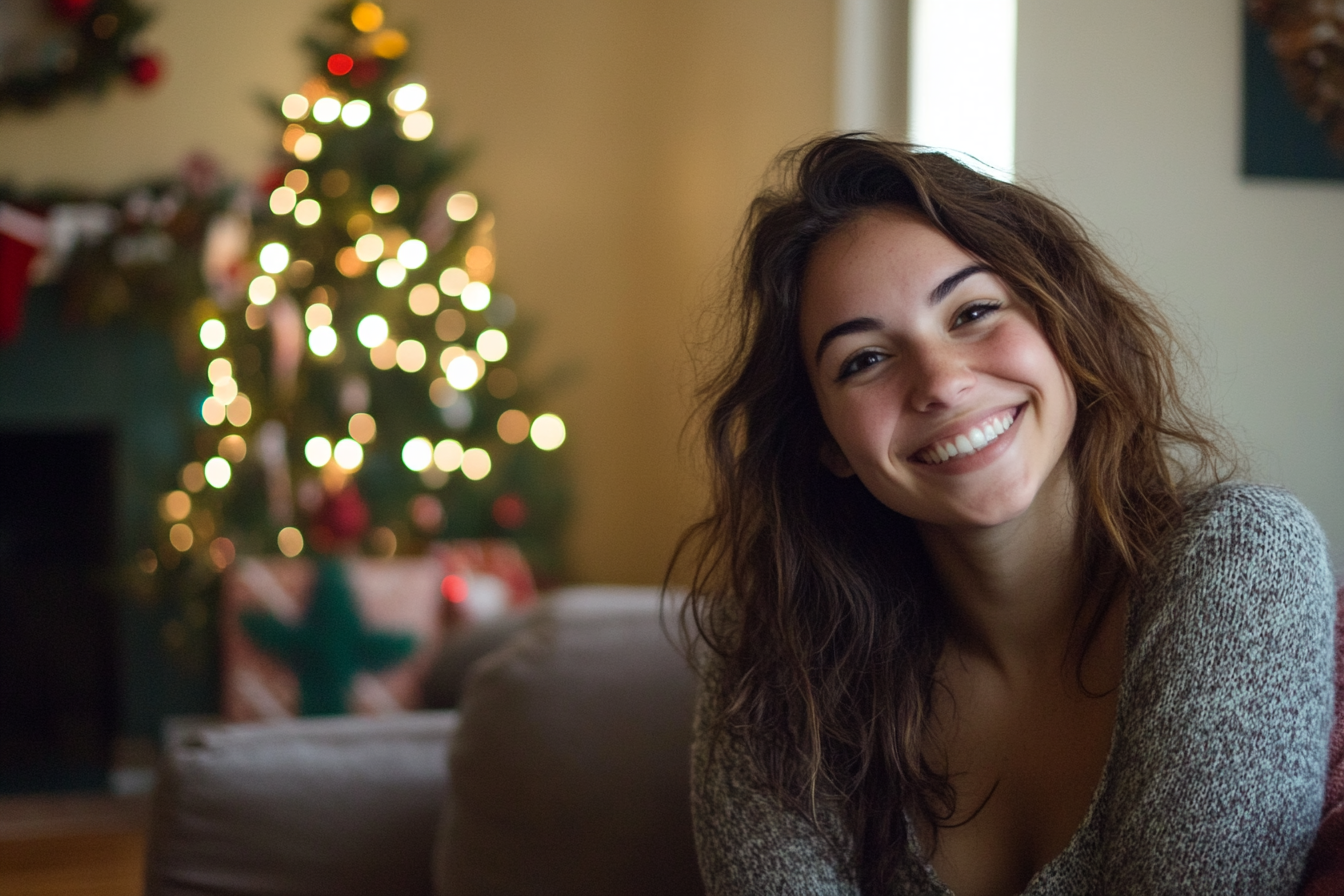 Una mujer sentada en un salón en Navidad | Fuente: Midjourney