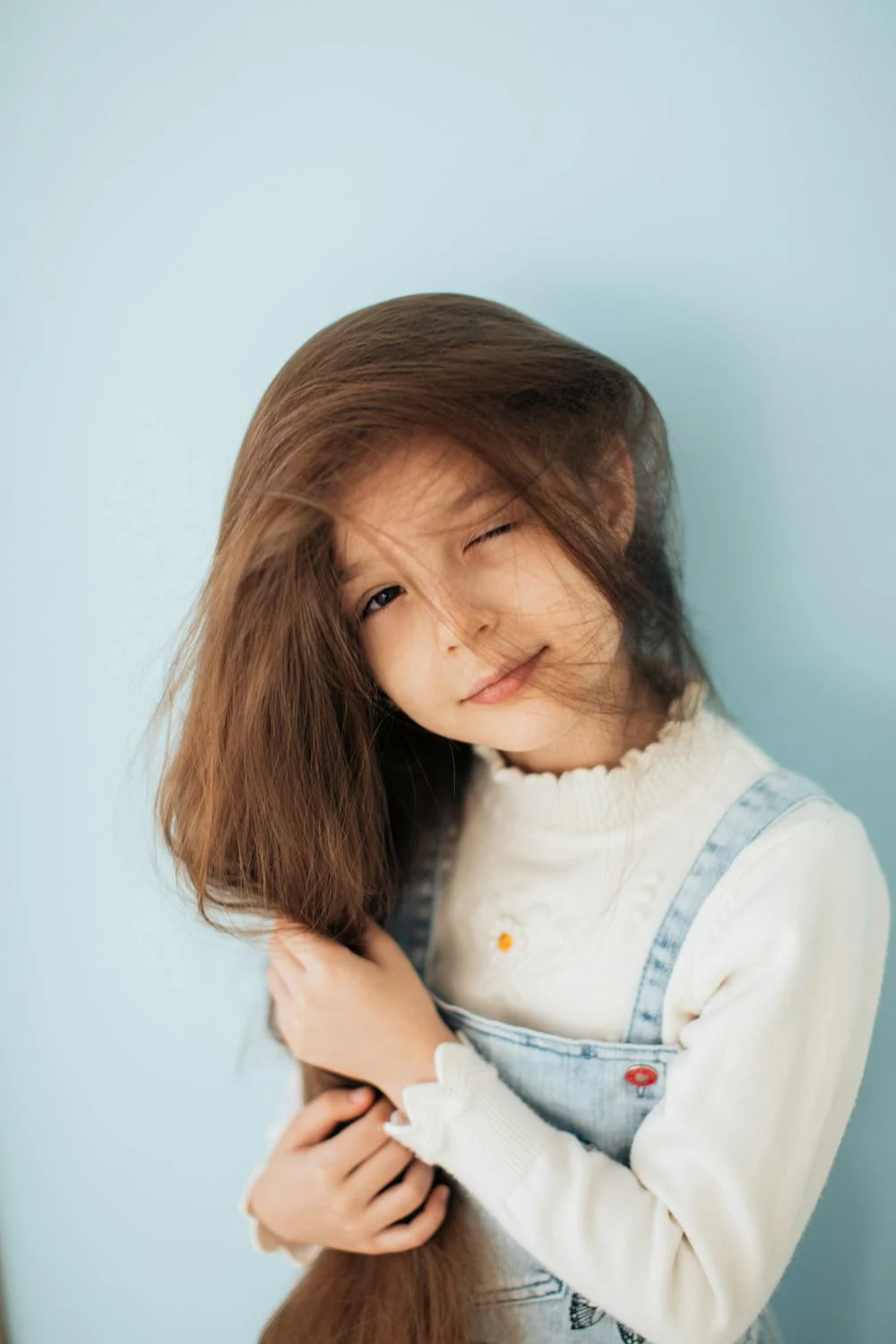 Una niña sonriente | Fuente: Pexels