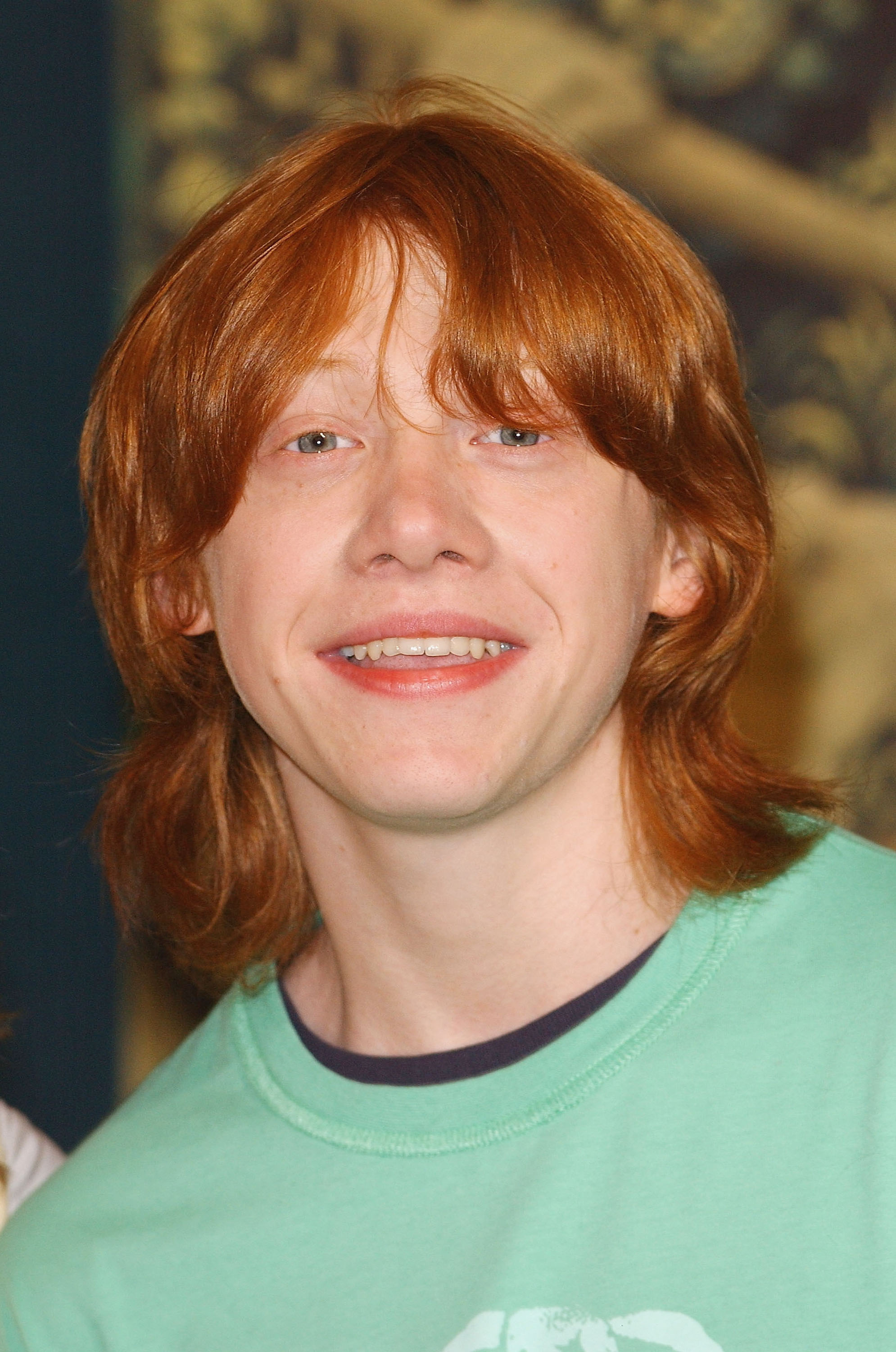 Rupert Grint en un photocall previo al estreno en el Reino Unido de "Harry Potter and the Prisoner of Azkaban"  el 27 de mayo de 2004, en Londres | Fuente: Getty Images