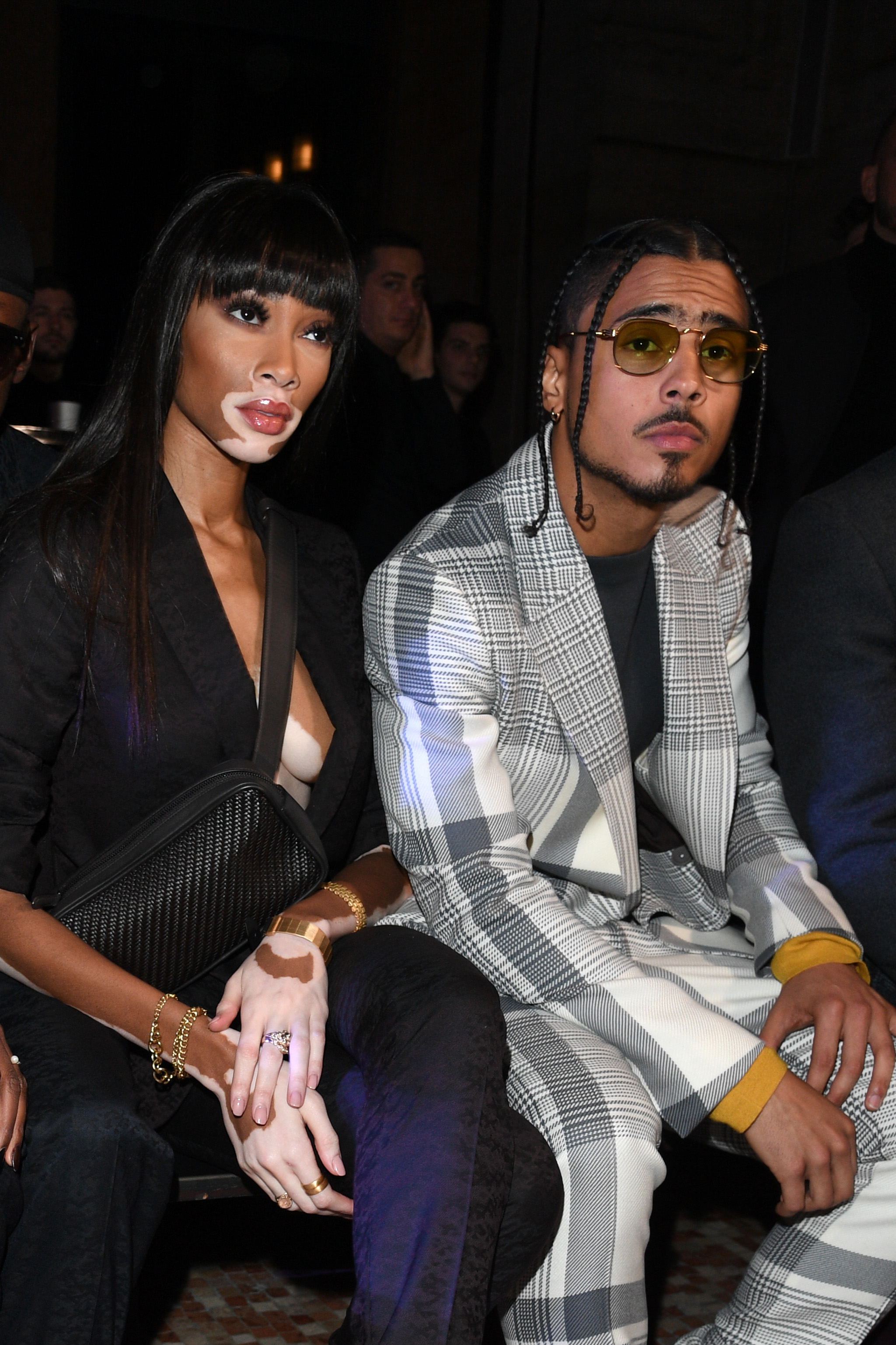 Winnie Harlow y Quincy Brown asisten al desfile de Ermenegildo Zegna el 11 de enero de 2019, en Milán, Italia. | Fuente: Getty Images