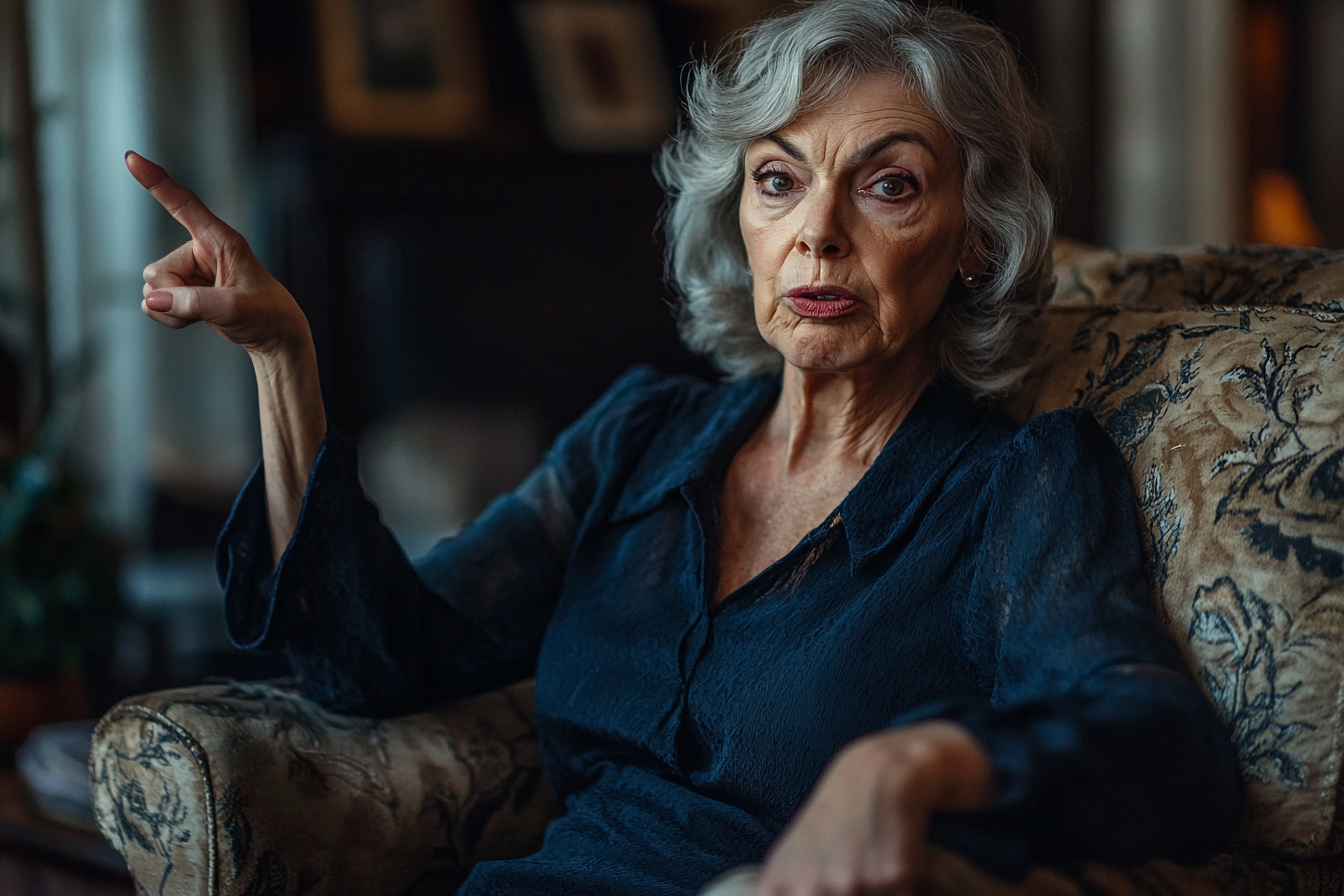 Una mujer con cara de enfado en un sillón | Fuente: Midjourney