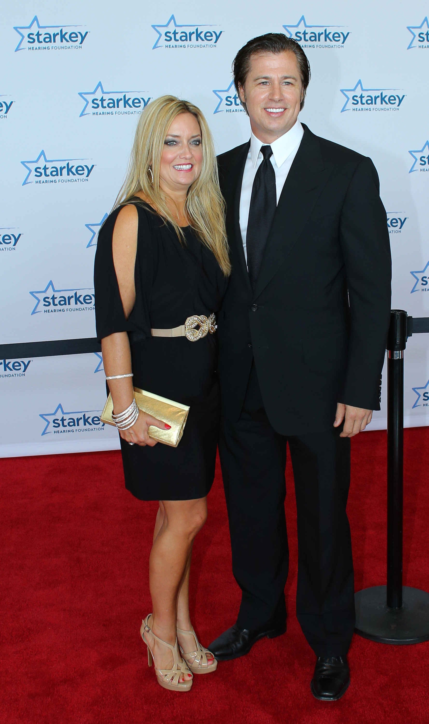 Lisa y Doug Pitt asisten a la Gala de los Premios Starkey Hearing Foundation's So the World May Hear 2013 el 28 de julio de 2013 | Fuente: Getty Images