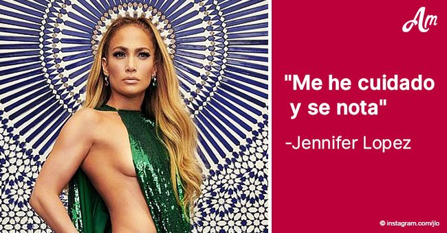 Jennifer López posa con nada más que atrevida capa verde, ¡como Dios la trajo al mundo!