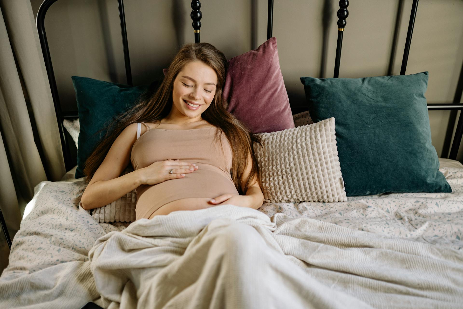 Una mujer en la cama | Fuente: Pexels