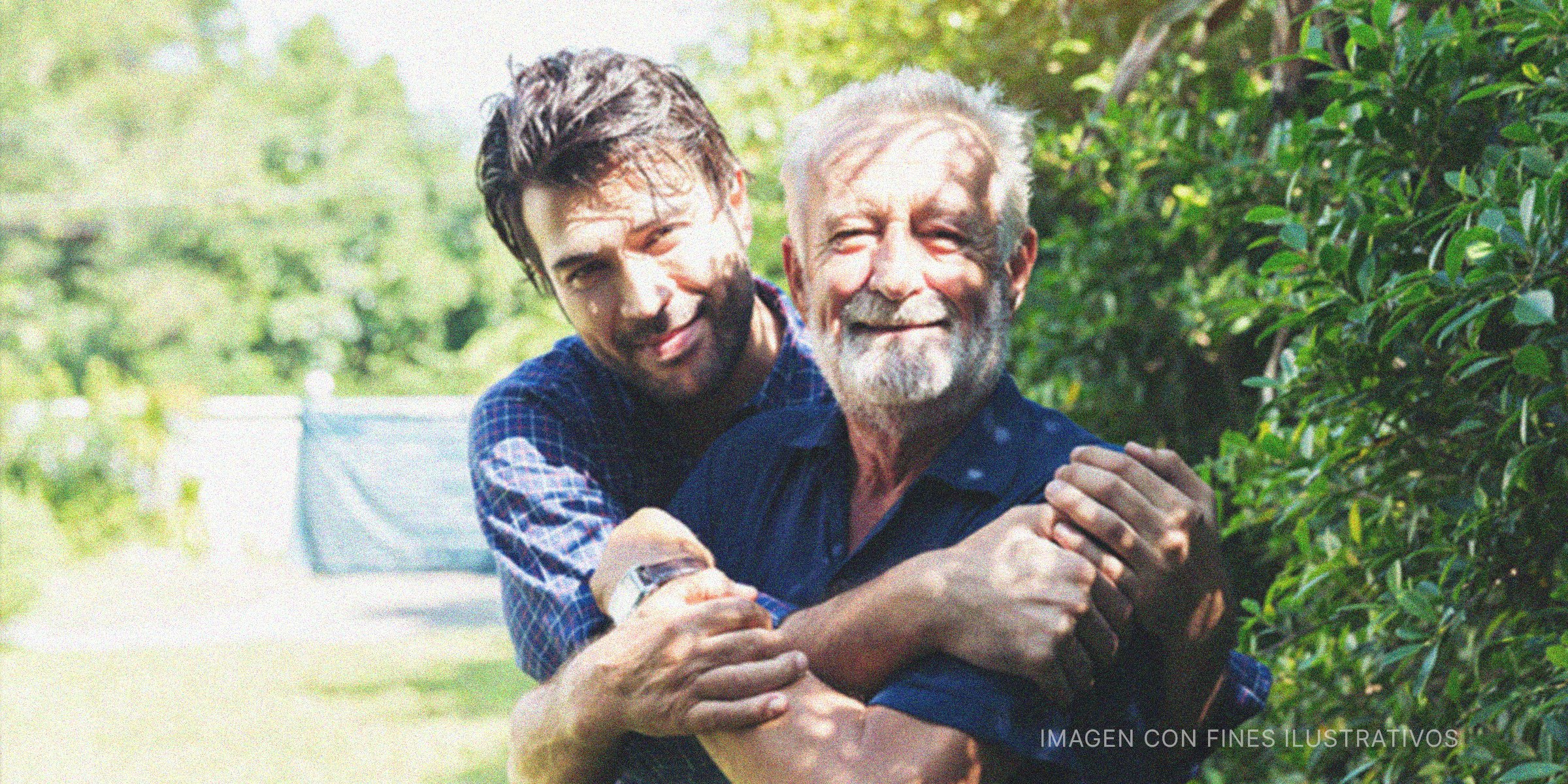Hijo abrazando a su papá. | Foto: Shutterstock