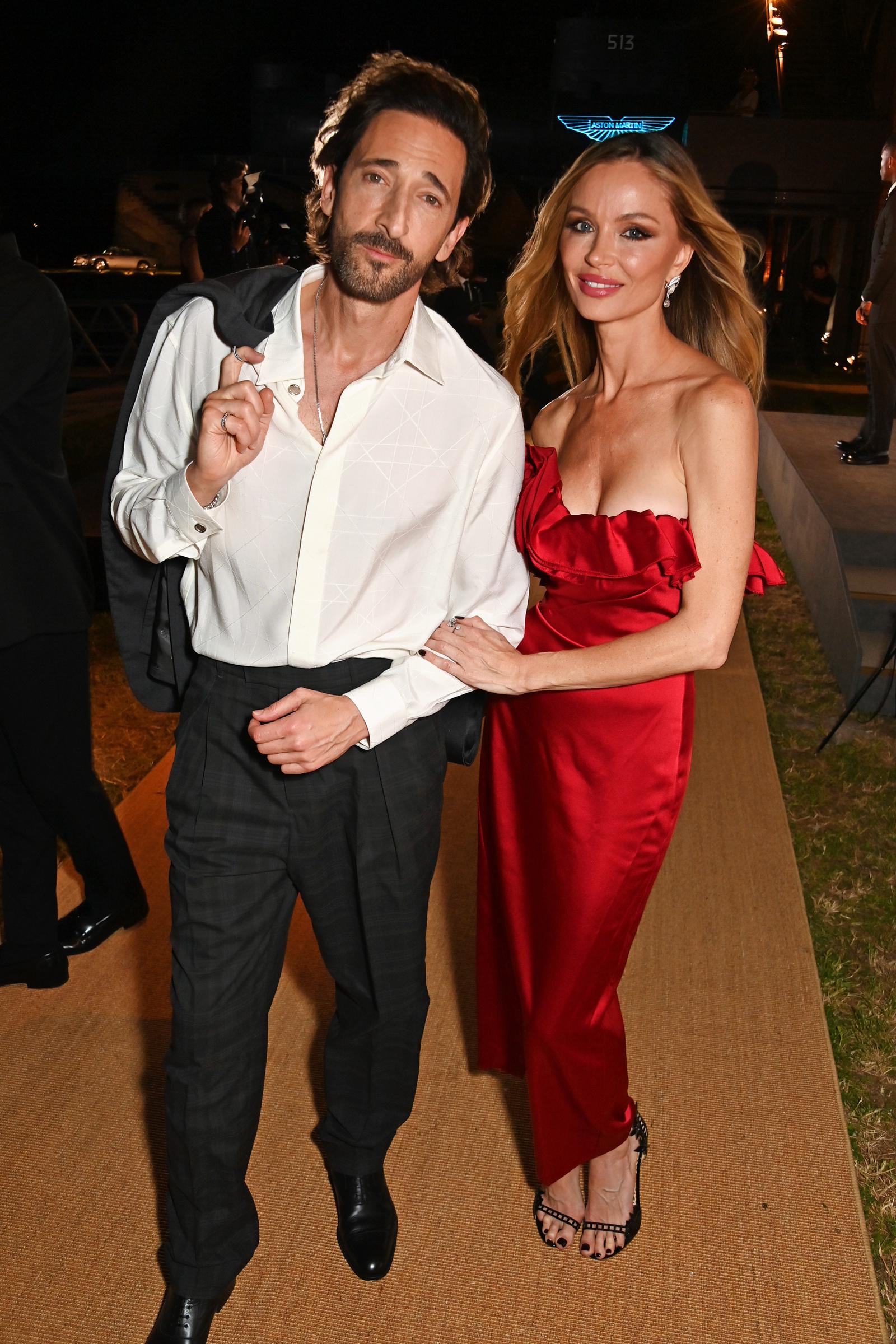 Adrien Brody y Georgina Chapman asisten a la presentación del nuevo Aston Martin Vanquish el 2 de septiembre de 2024, en Venecia, Italia | Fuente: Getty Images