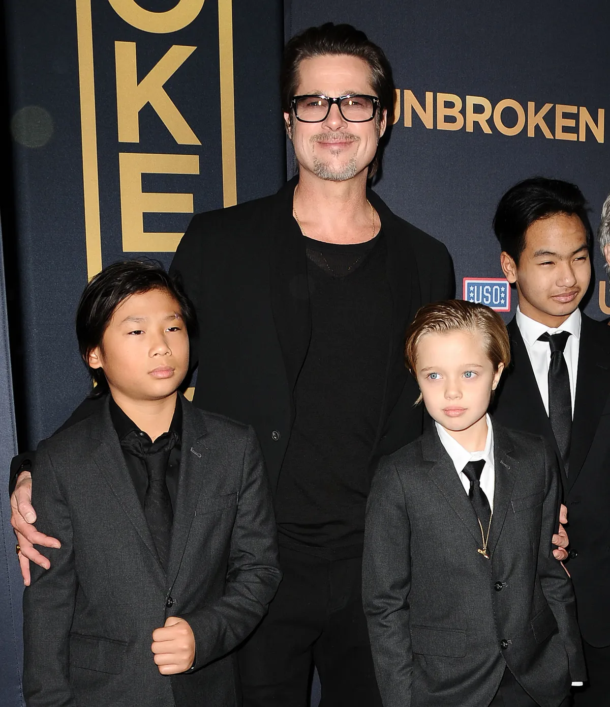 Pax Jolie-Pitt, Brad Pitt, Shiloh Jolie-Pitt y Maddox Jolie-Pitt en el estreno de "Unbroken", 2014 | Foto: Getty Images
