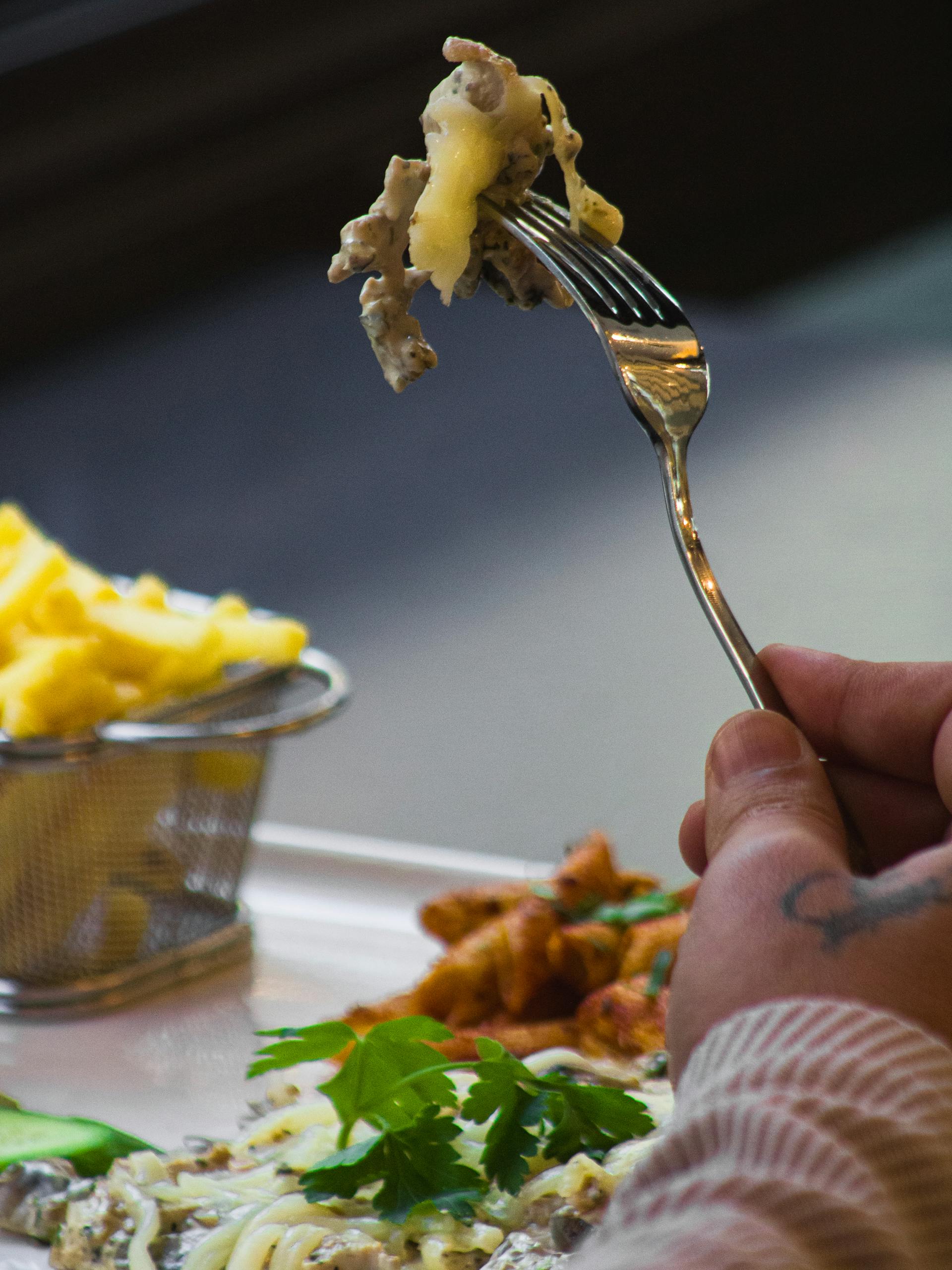 Comida en un tenedor | Fuente: Pexels