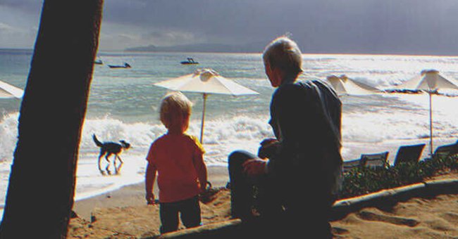 Un adulto y un niño en la playa | Foto: Shutterstock