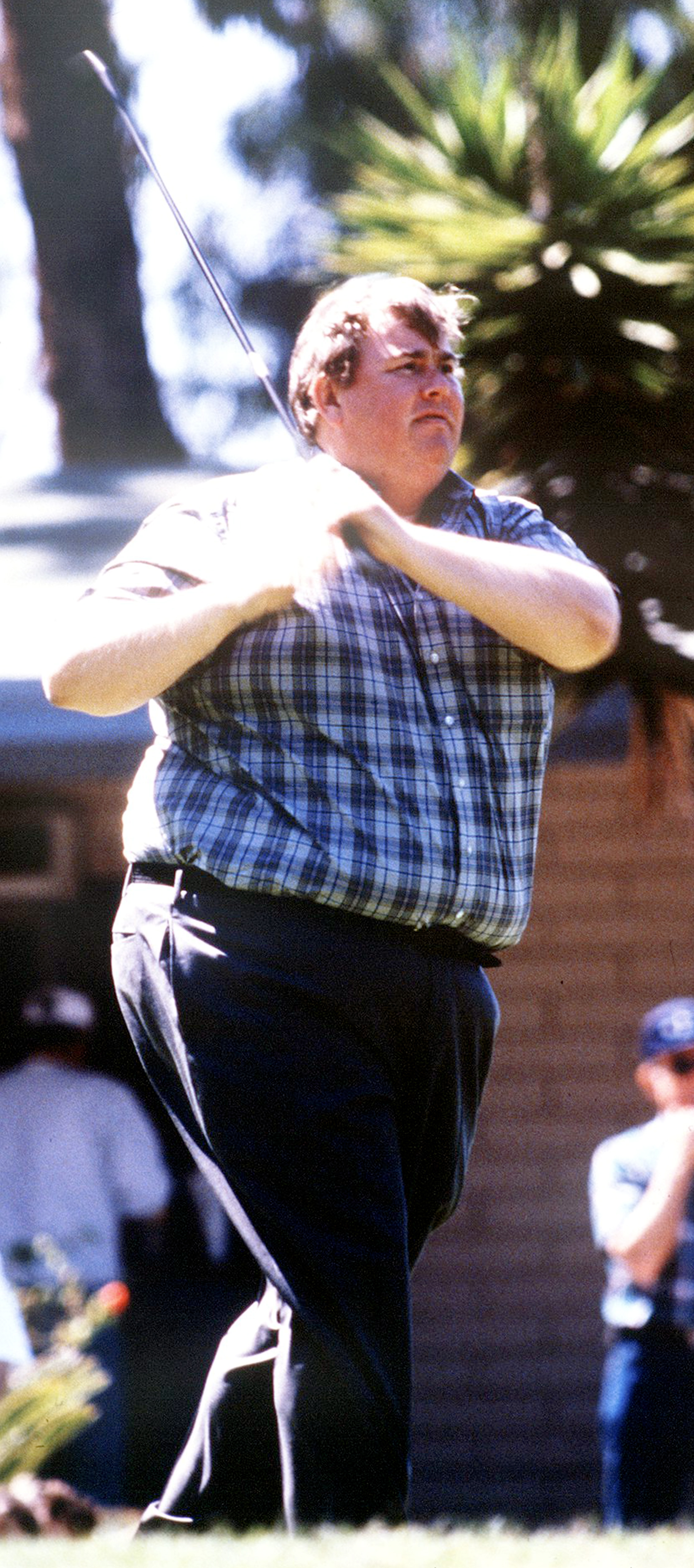 John Candy jugando al golf, hacia 1990 | Foto: Getty Images