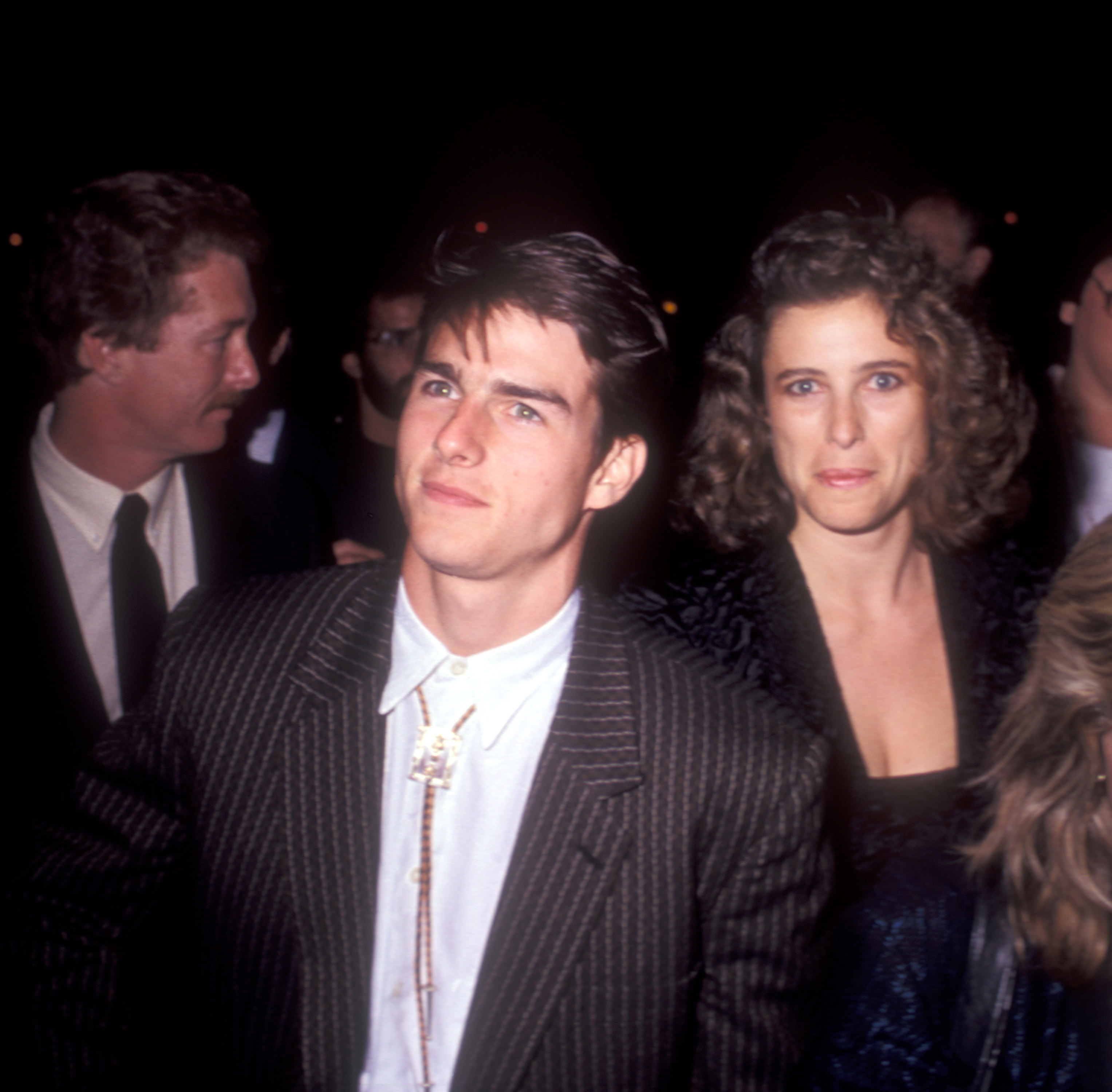 Tom Cruise y Mimi Rogers durante el estreno de "The Color of Money" en Los Ángeles, California, el 14 de octubre de 1986. | Fuente: Getty Images