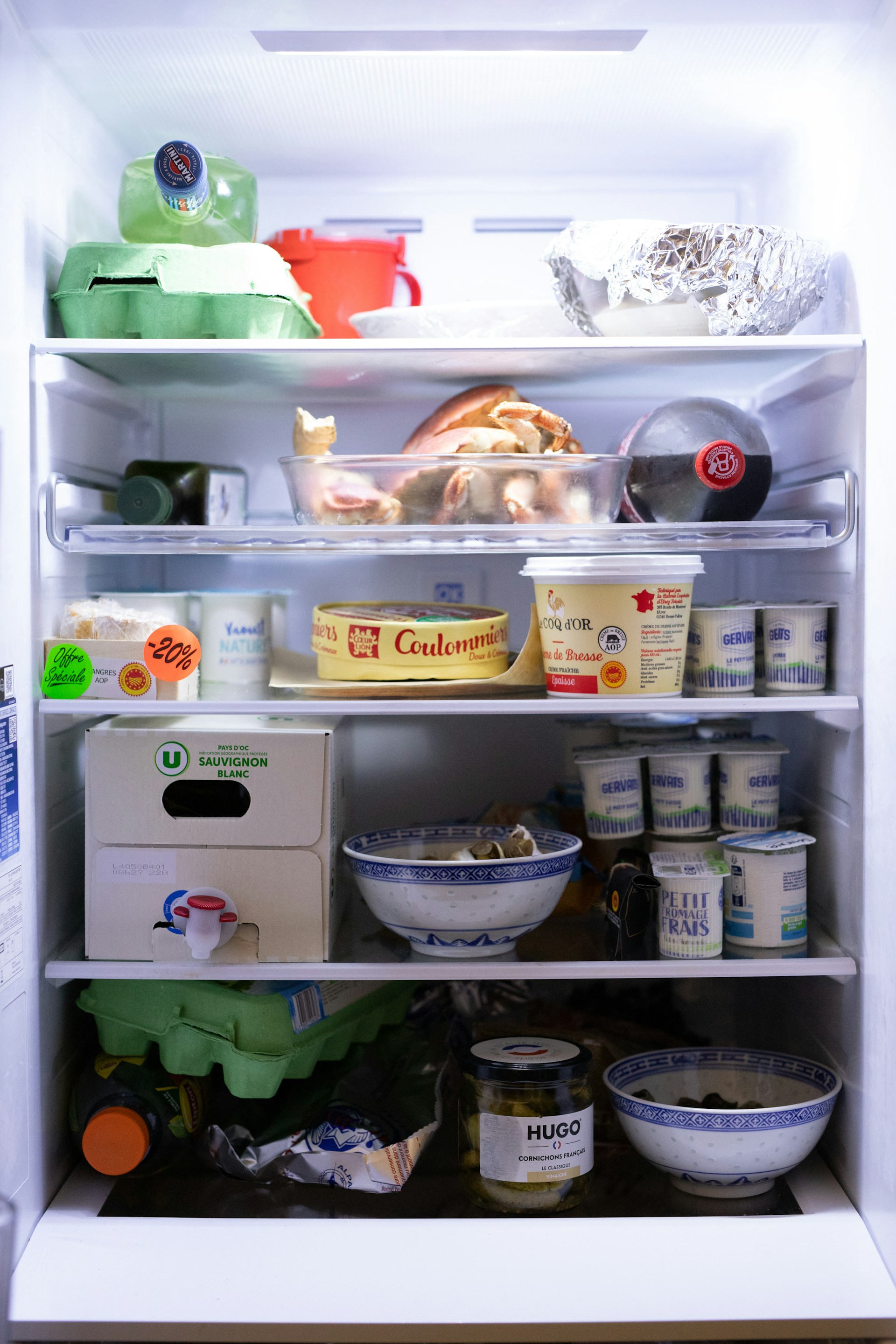 Alimentos almacenados en un refrigerador | Fuente: Unsplash