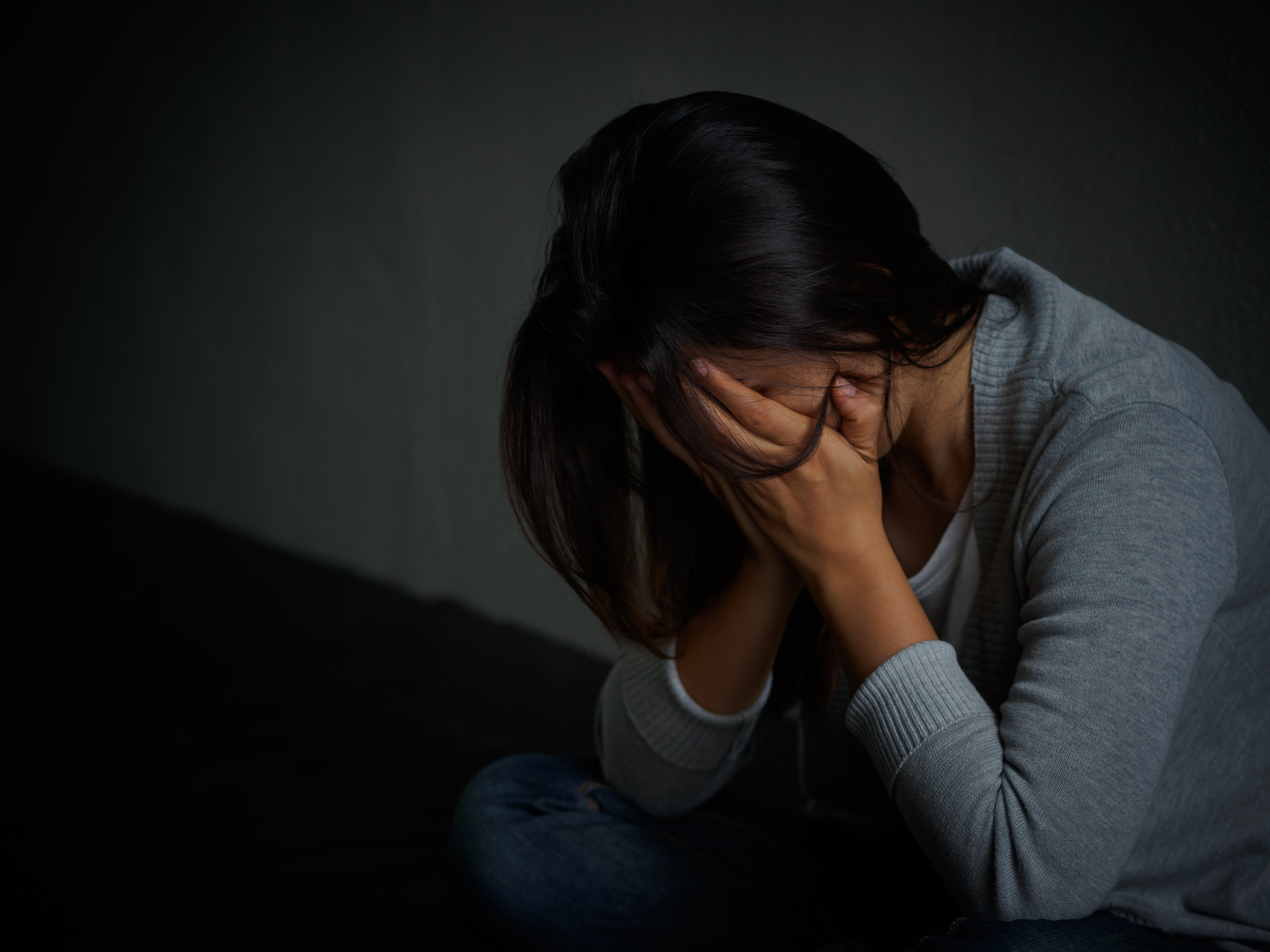 Mujer triste | Fuente: Shutterstock