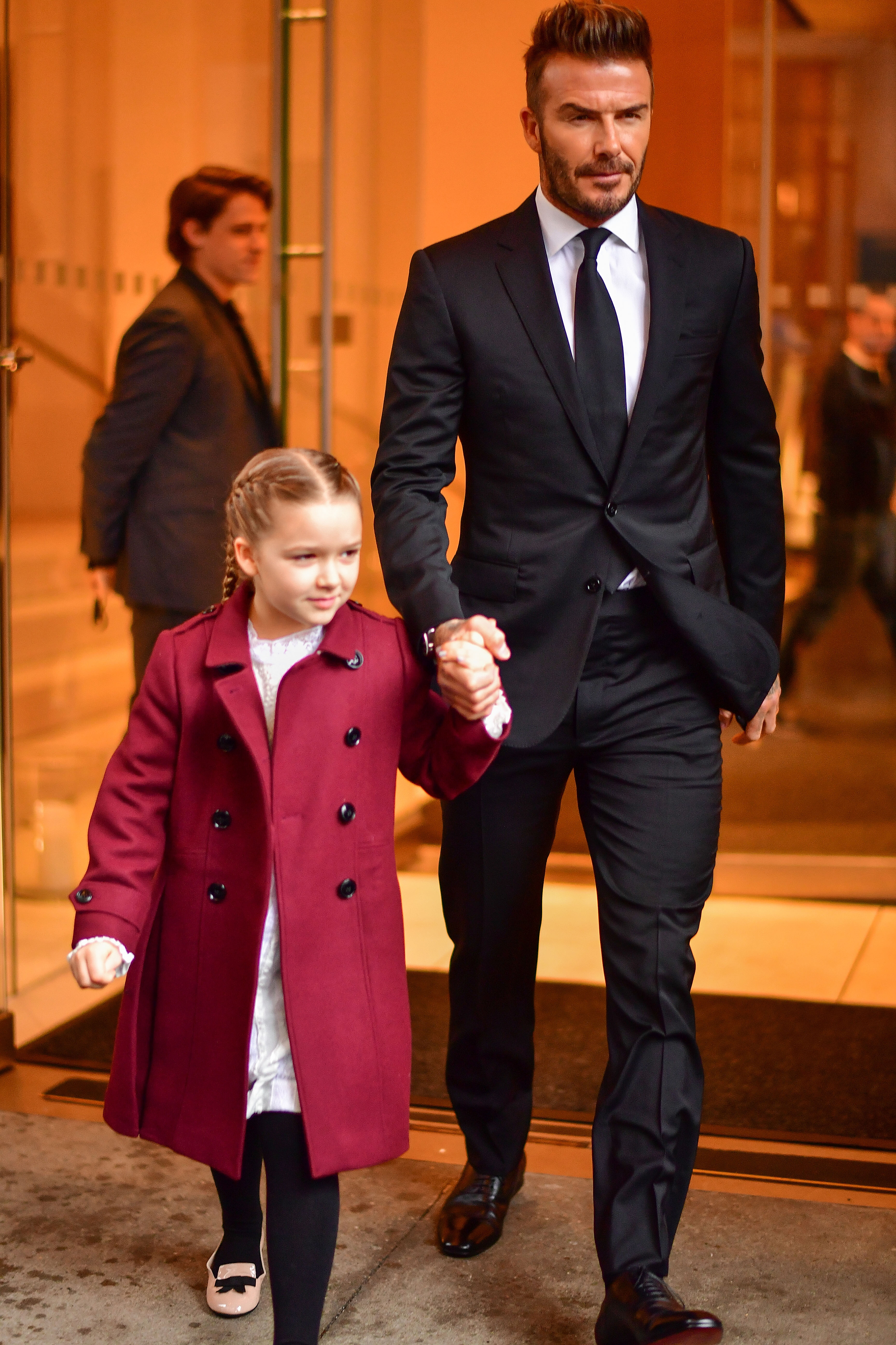 Harper Beckham y David Beckham en Manhattan el 11 de febrero de 2018 | Foto: Getty Images