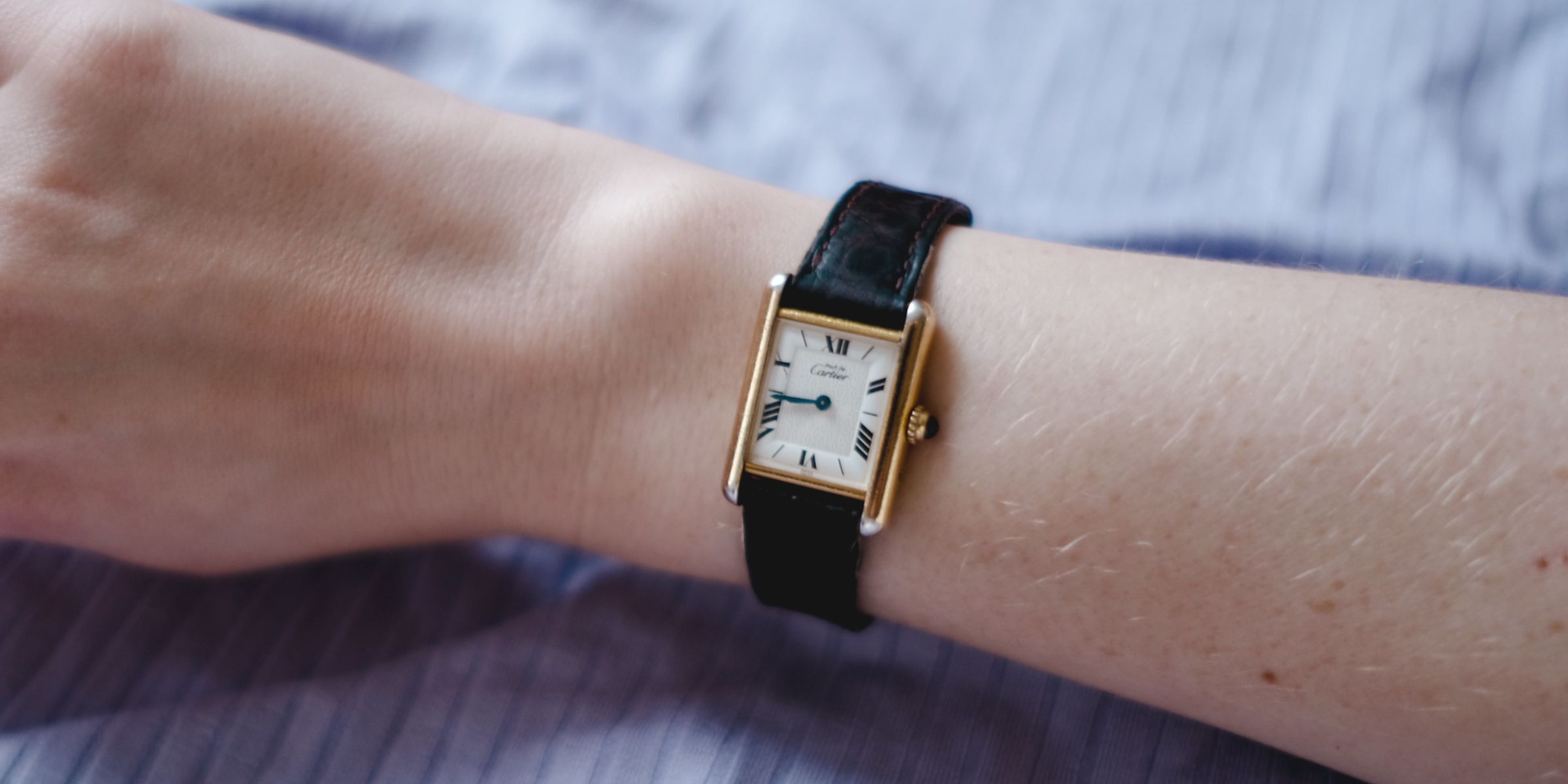 Una persona con un reloj de lujo | Fuente: Flickr