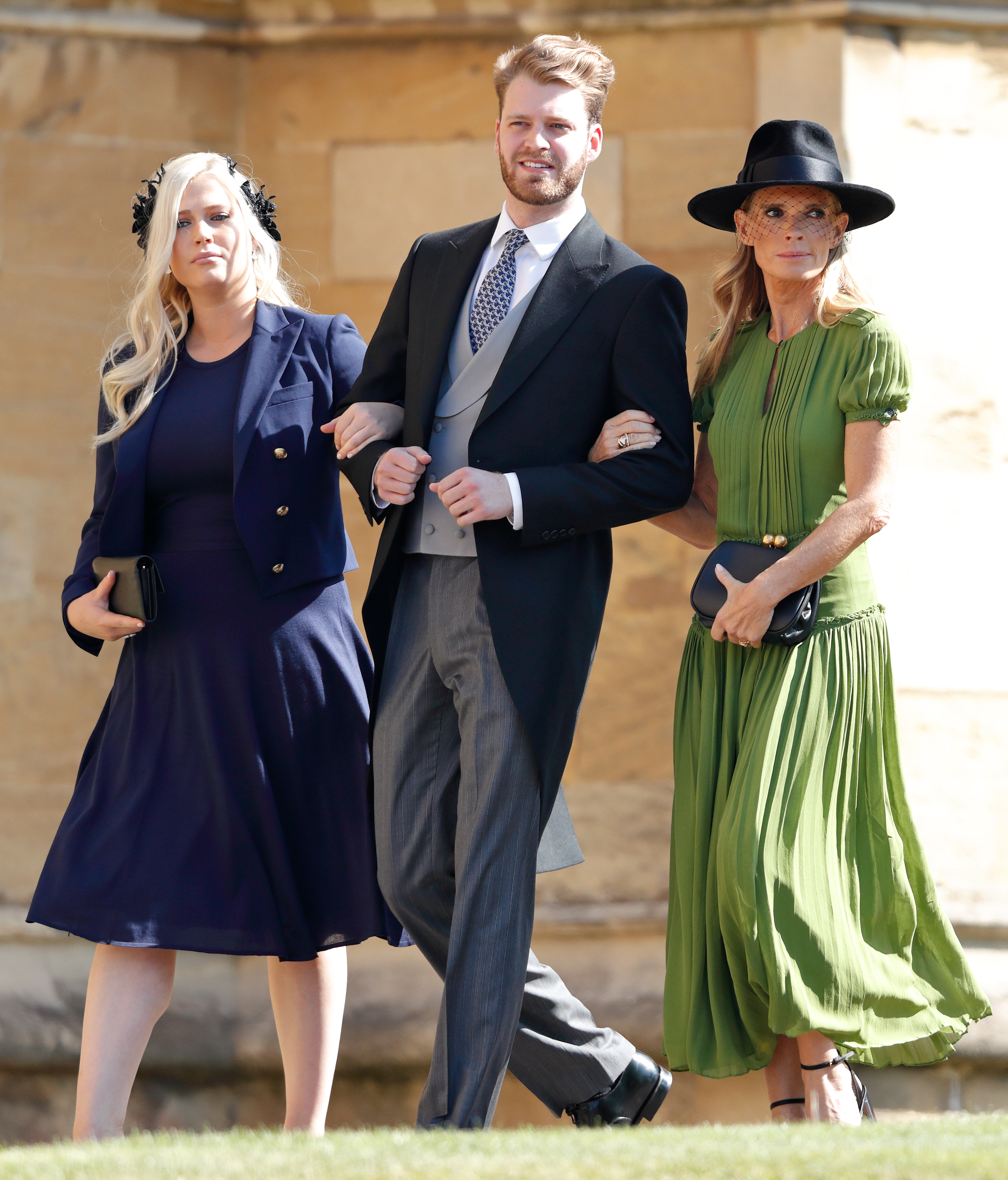 Lady Eliza Spencer, Louis Spencer y Victoria Aitken asisten a la boda del príncipe Harry y Meghan Markle en la capilla de St George del castillo de Windsor el 19 de mayo de 2018 en Windsor, Inglaterra. | Fuente: Getty Images