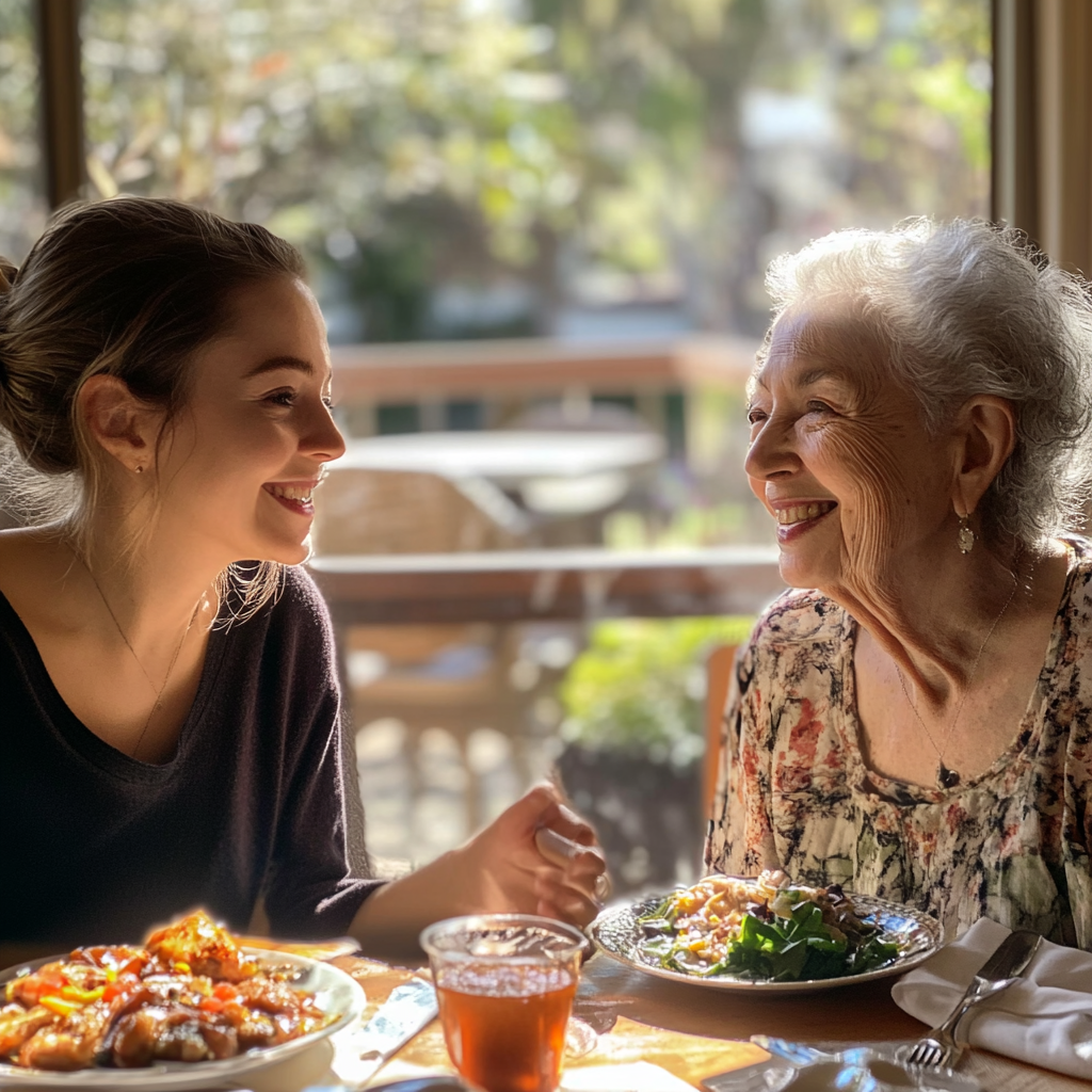 Una joven y una mujer mayor almorzando | Fuente: Midjourney