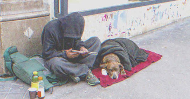 Un mendigo y su perro en la calle | Foto: Shutterstock