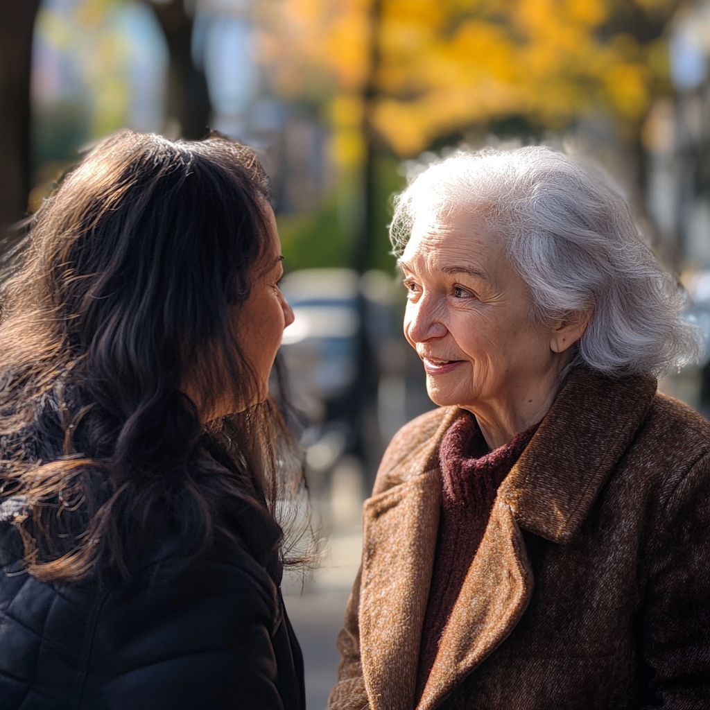 Mujeres manteniendo una conversación | Fuente: Midjourney