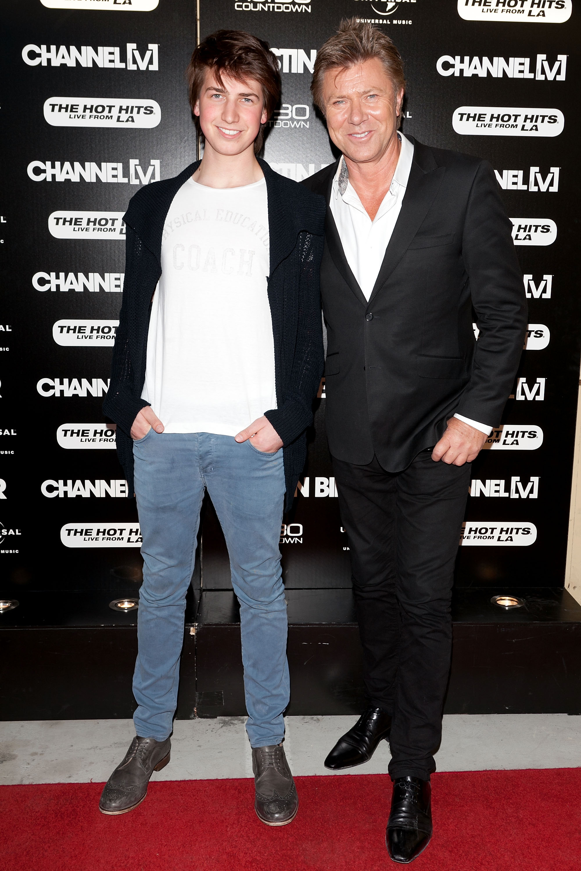 Christian Wilkins y su famoso padre en el Entertainment Quarter para el concierto acústico exclusivo de Justin Bieber el 17 de julio de 2012, en Sydney, Australia. | Fuente: Getty Images