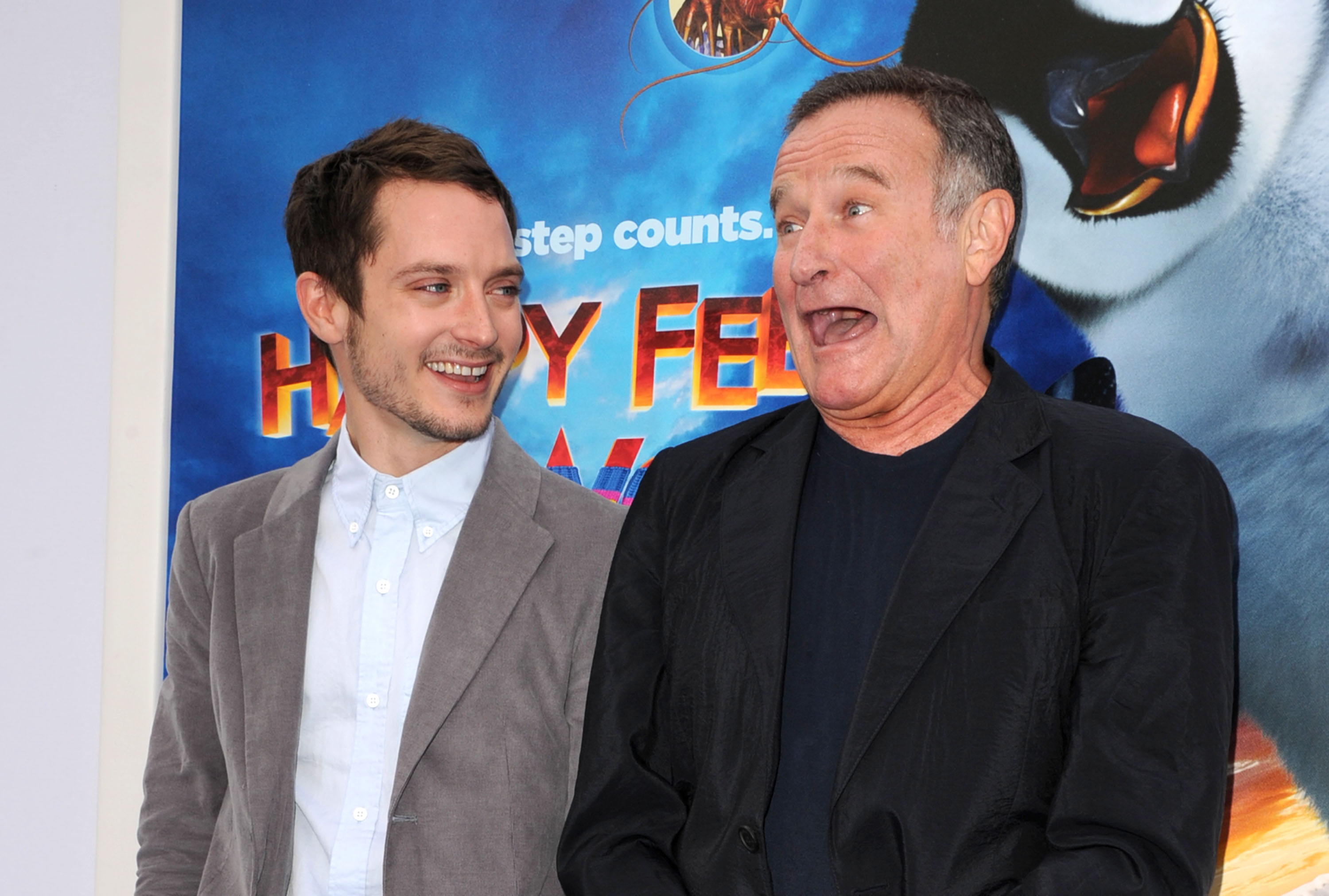 Elijah Wood y Robin Williams en el estreno de "Happy Feet Two" el 13 de noviembre de 2011, en Hollywood, California. | Fuente: Getty Images