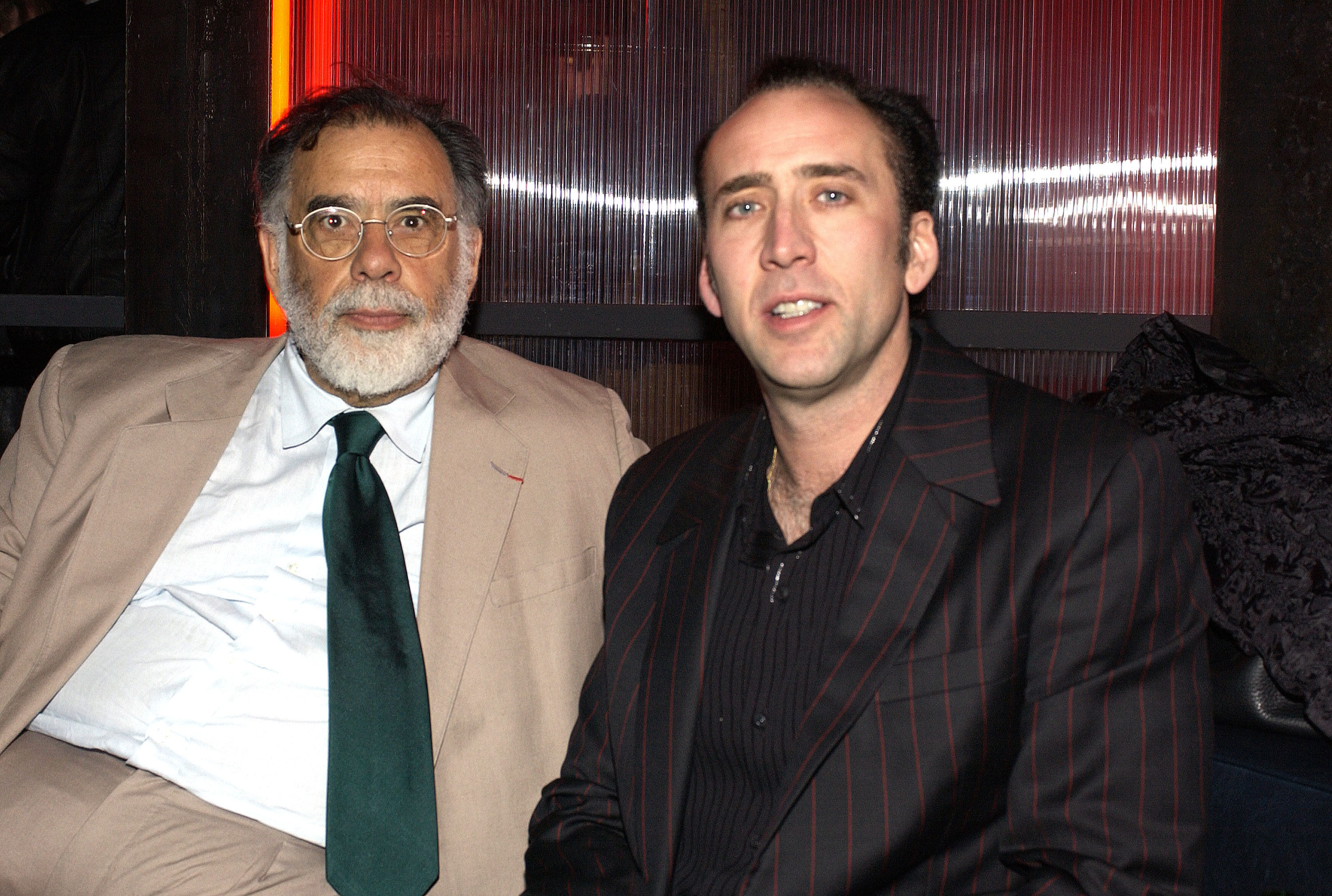 Francis Ford Coppola y Nicolas Cage en una fiesta el 17 de marzo de 2003, en Hollywood, California. | Fuente: Getty Images